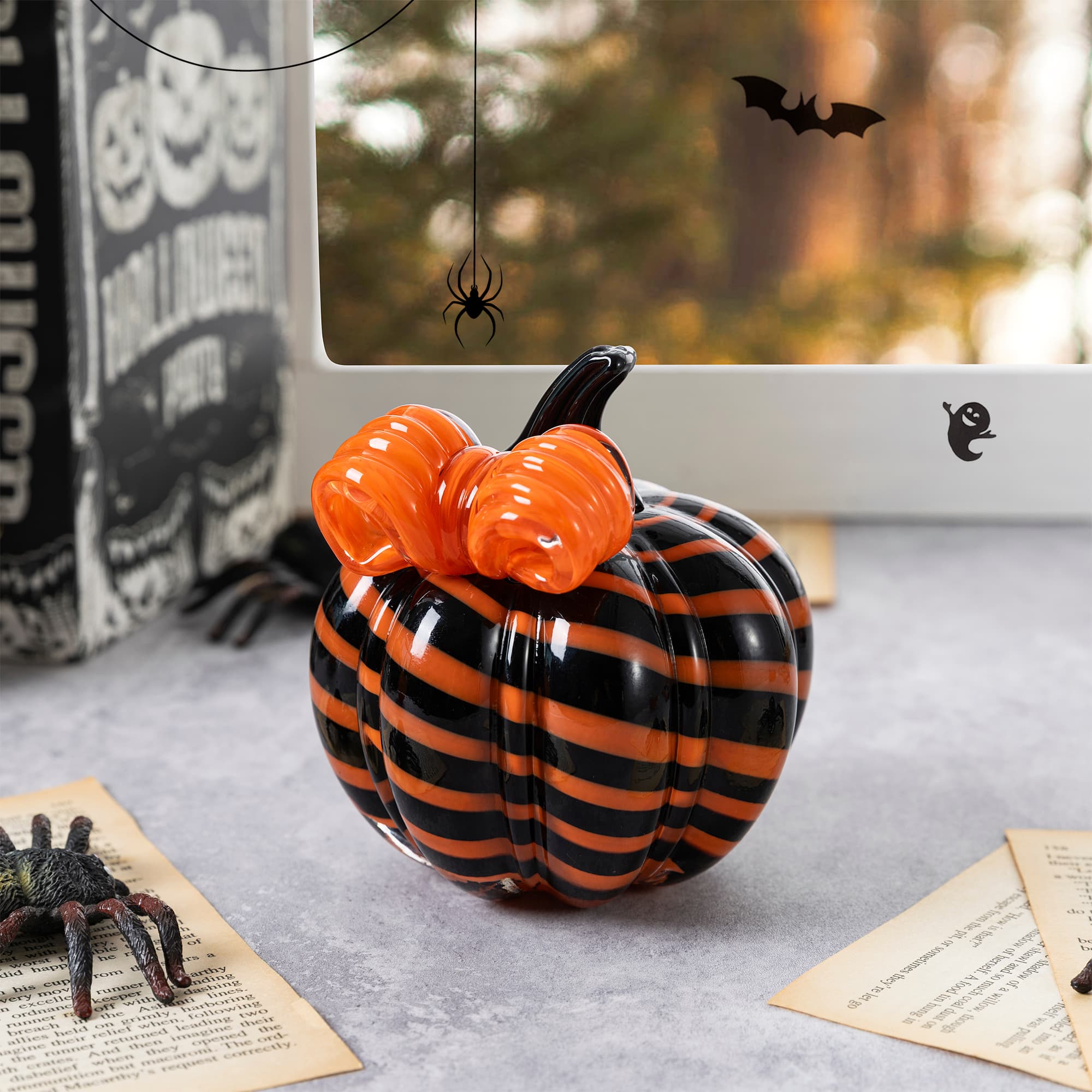 Glitzhome® 4.75" Halloween Striped Glass Pumpkin with Bow