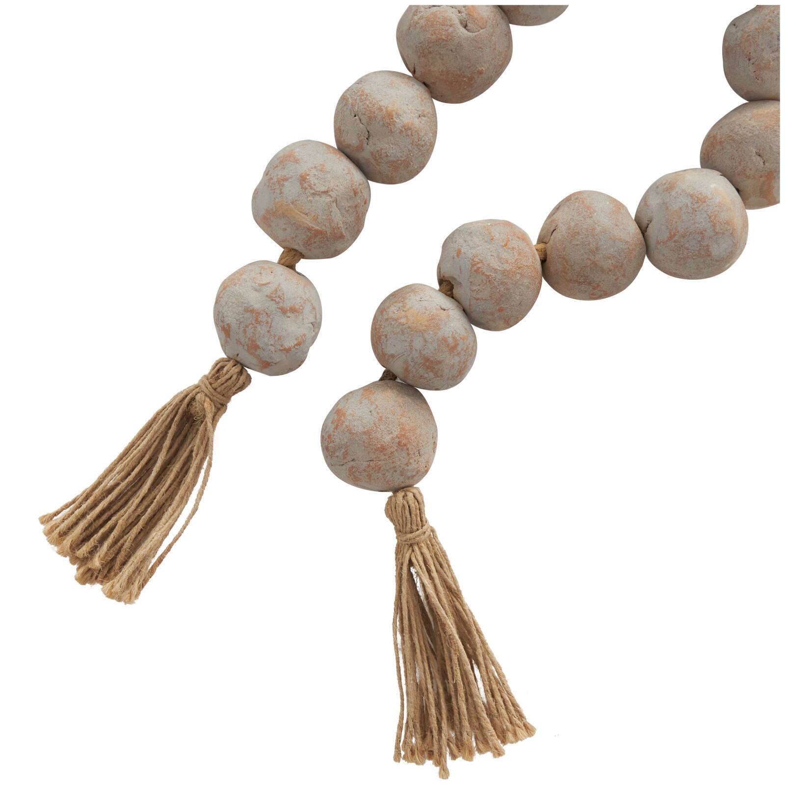 5ft. Paper Mache Round Distressed Beaded Garland with Tassel