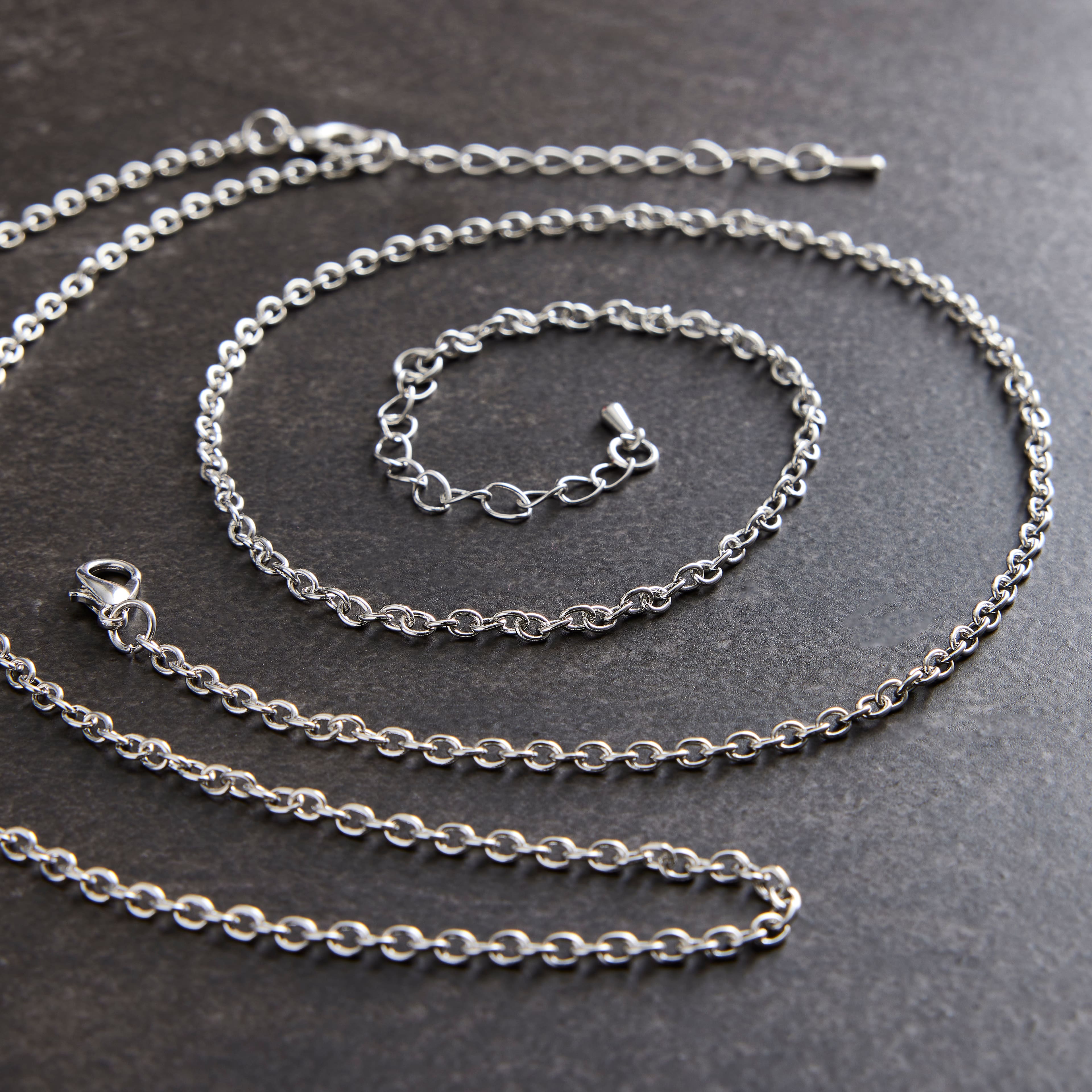 12 Packs: 2 ct. (24 total) 16" Rhodium Chain Necklaces
