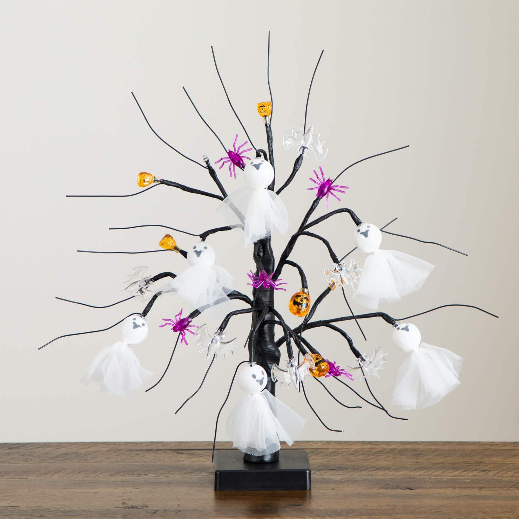 18in. Pre-Lit Artificial Halloween Ghost Dolls, Spiders, Bats & Pumpkins 24 LED Lighted Ornament Tree