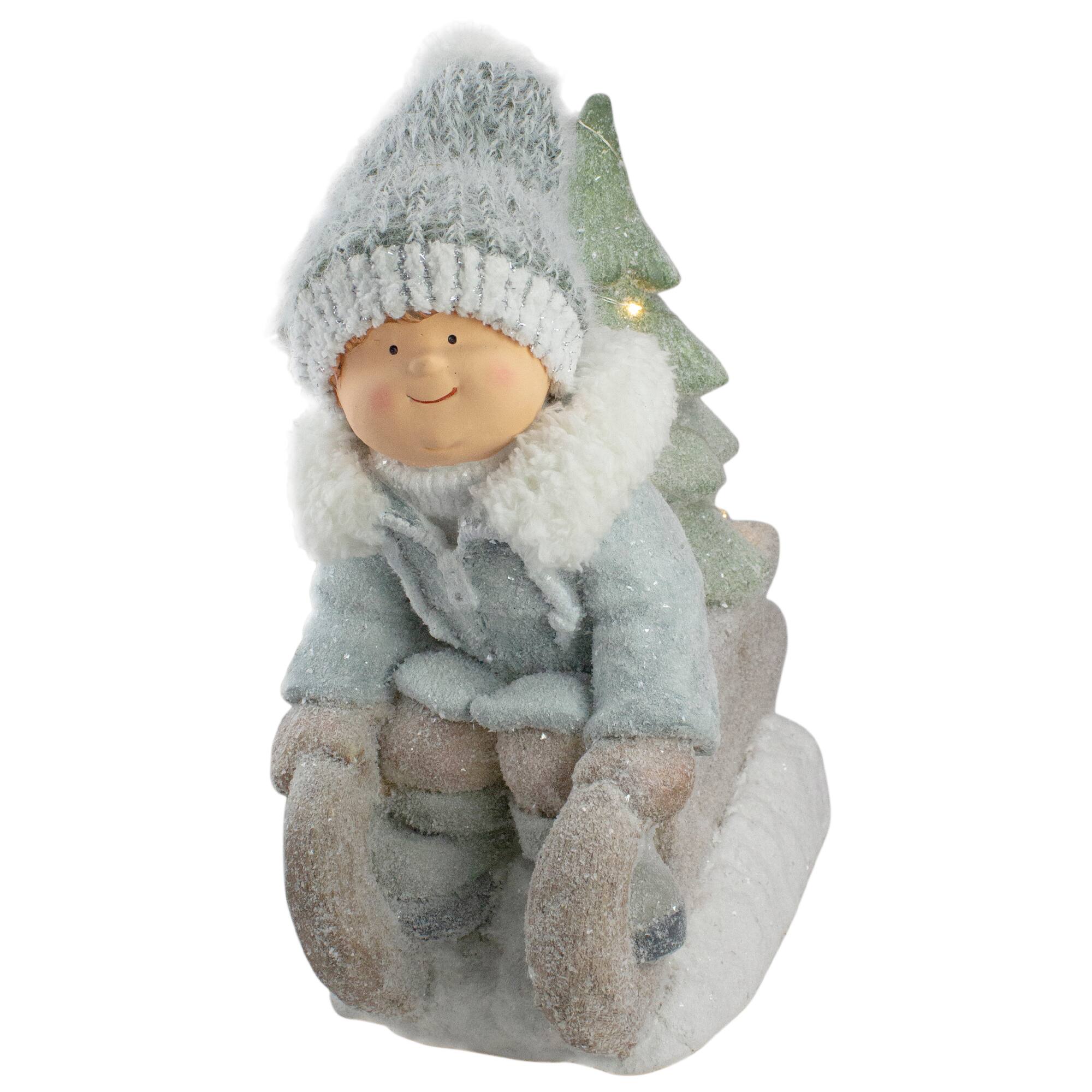 15" Beige & Green Lighted Boy on a Sled Christmas Decoration