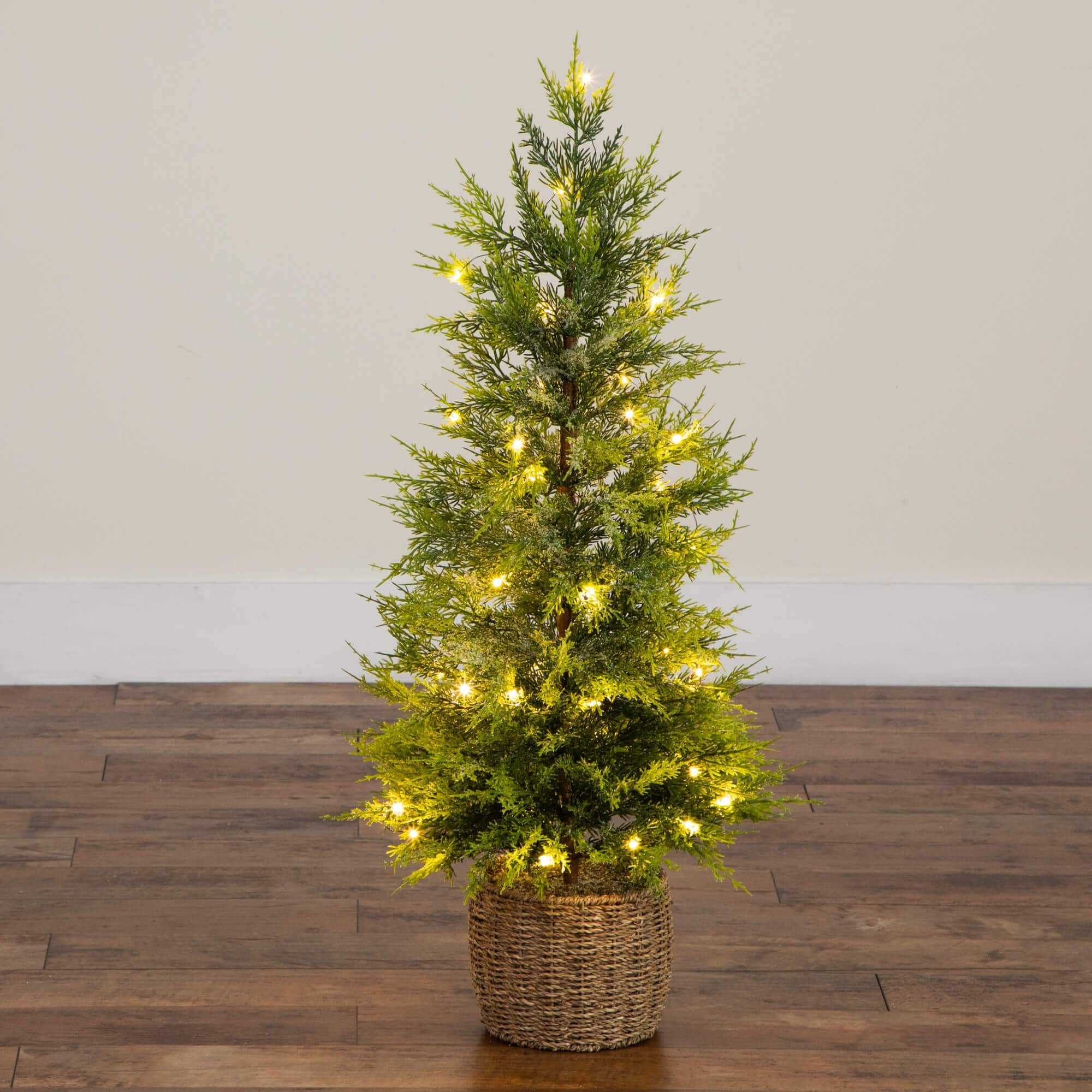 3ft. Pre-Lit Artificial Lightly Snowed Cypress Christmas Tree with 38 Warm White LED Lights in Decorative Weaved Basket
