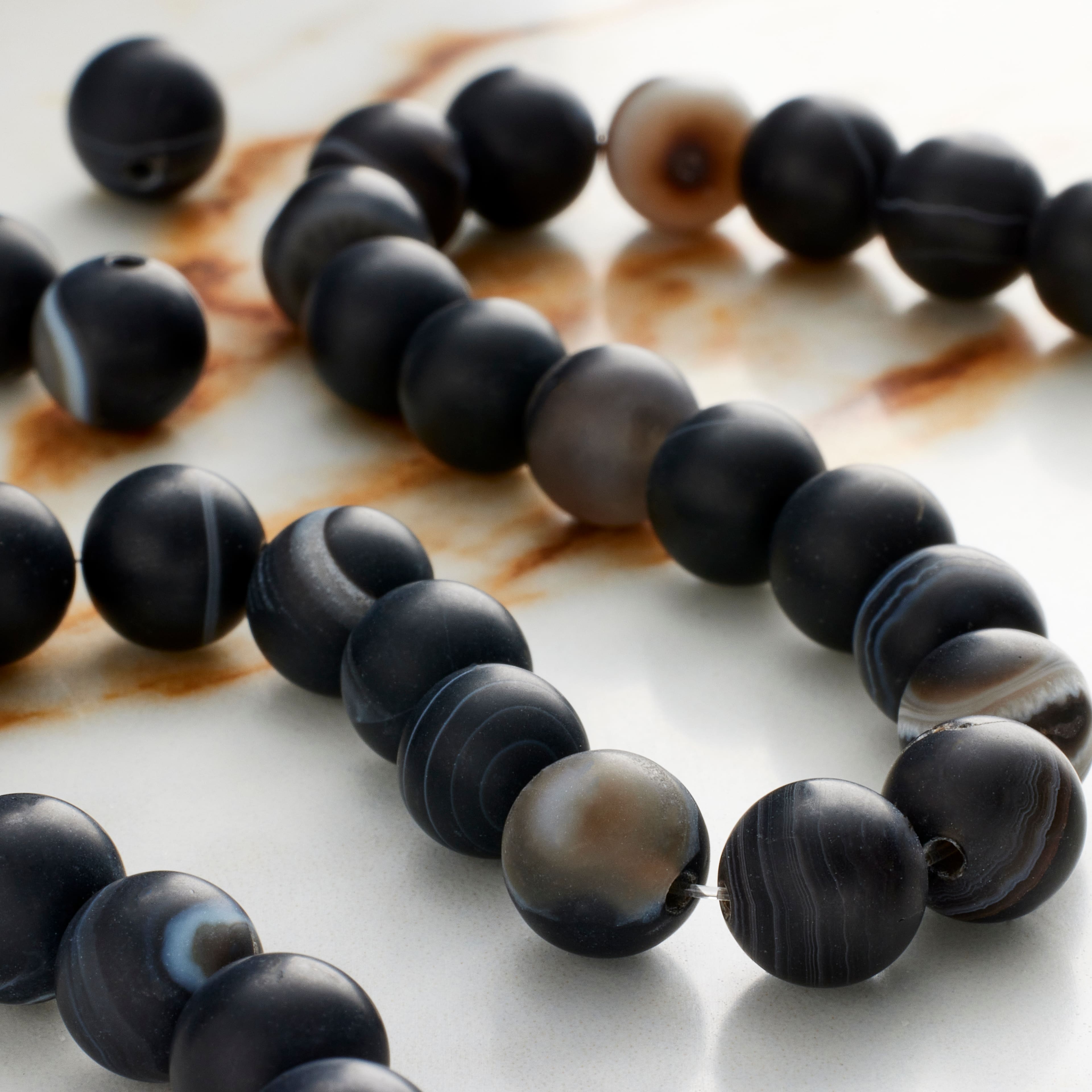 12 Pack: Matte Black & Brown Striped Agate Round Beads, 8mm by Bead Landing™