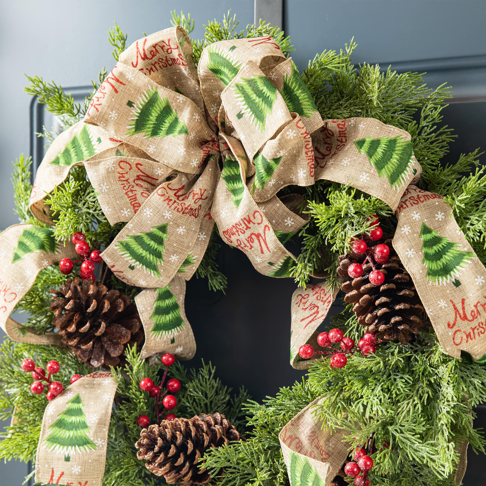 Glitzhome® 24" Cypress Leaves & Pinecone Wreath with Ribbon & Bow