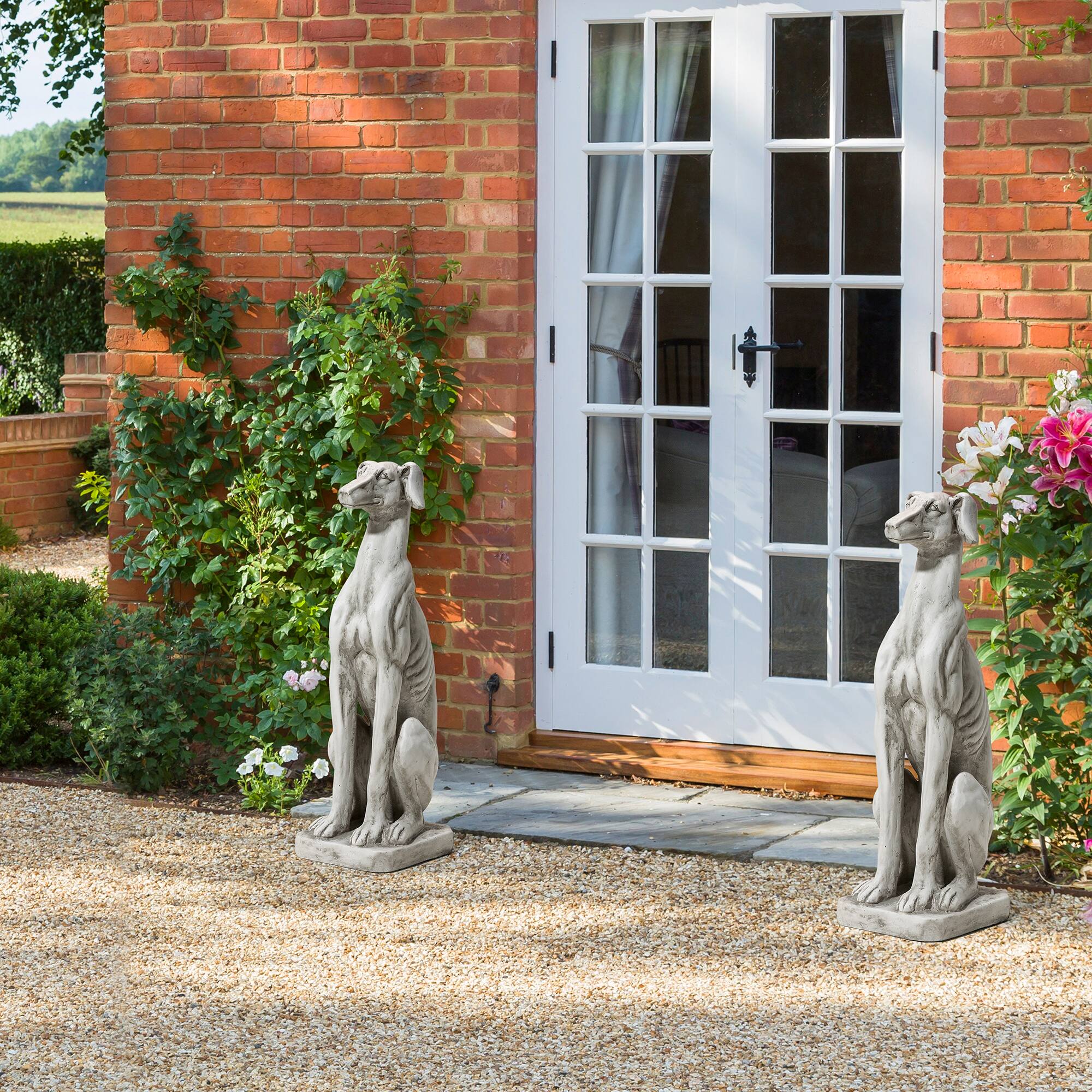 Glitzhome® 32" Sitting Dog Garden Statues, 2ct.