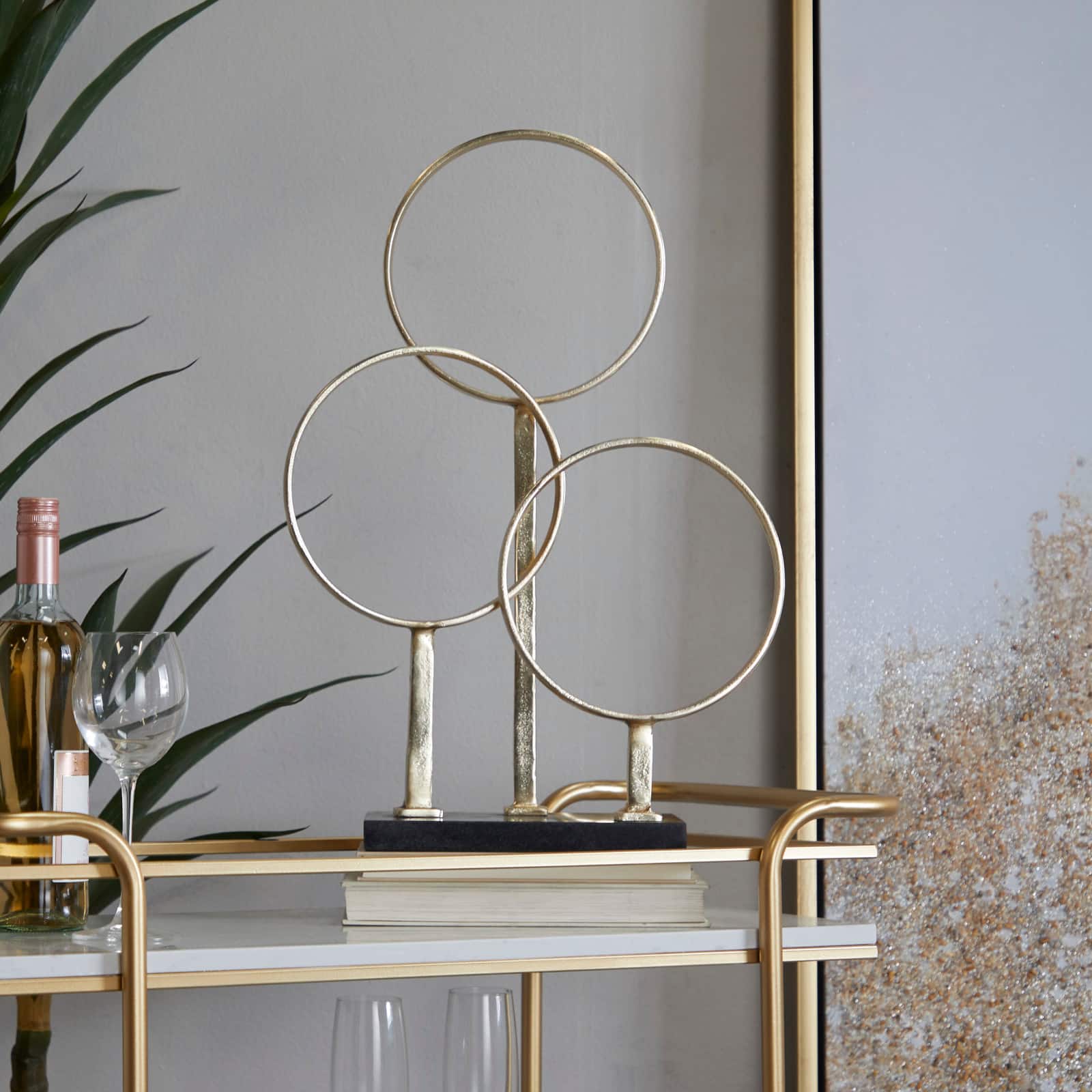 CosmoLiving by Cosmopolitan 21" Gold Aluminum 3-Rings Abstract Sculpture with Black Base