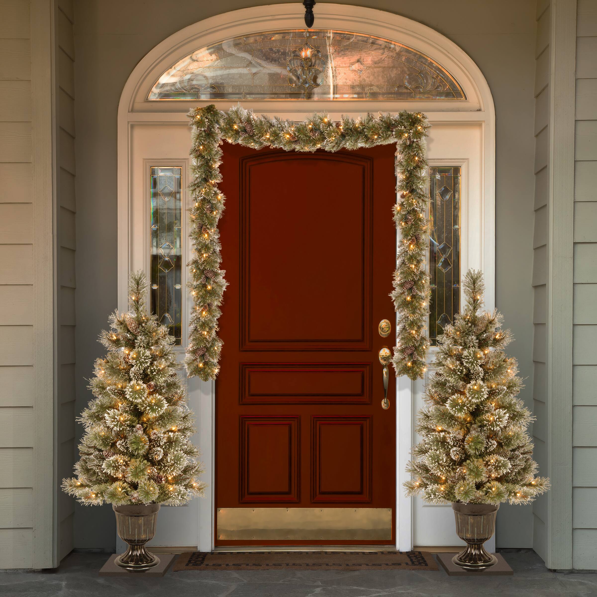 9' x 10" Pre-lit Glittery Bristle® Pine Artificial Christmas Garland with White Tipped Cones and 50 Clear Lights