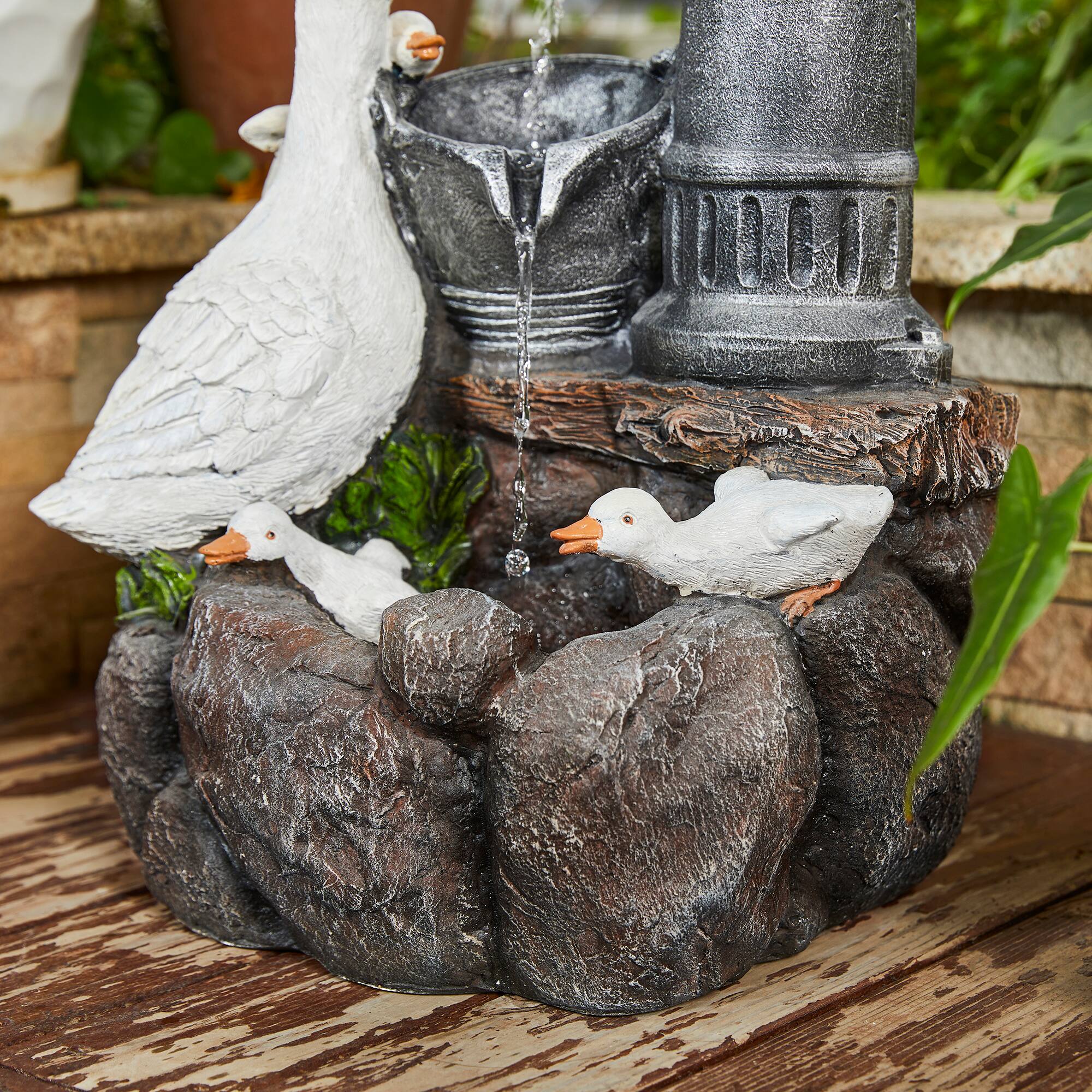 Glitzhome® 23.5" Duck Family Outdoor Fountain with LED Light
