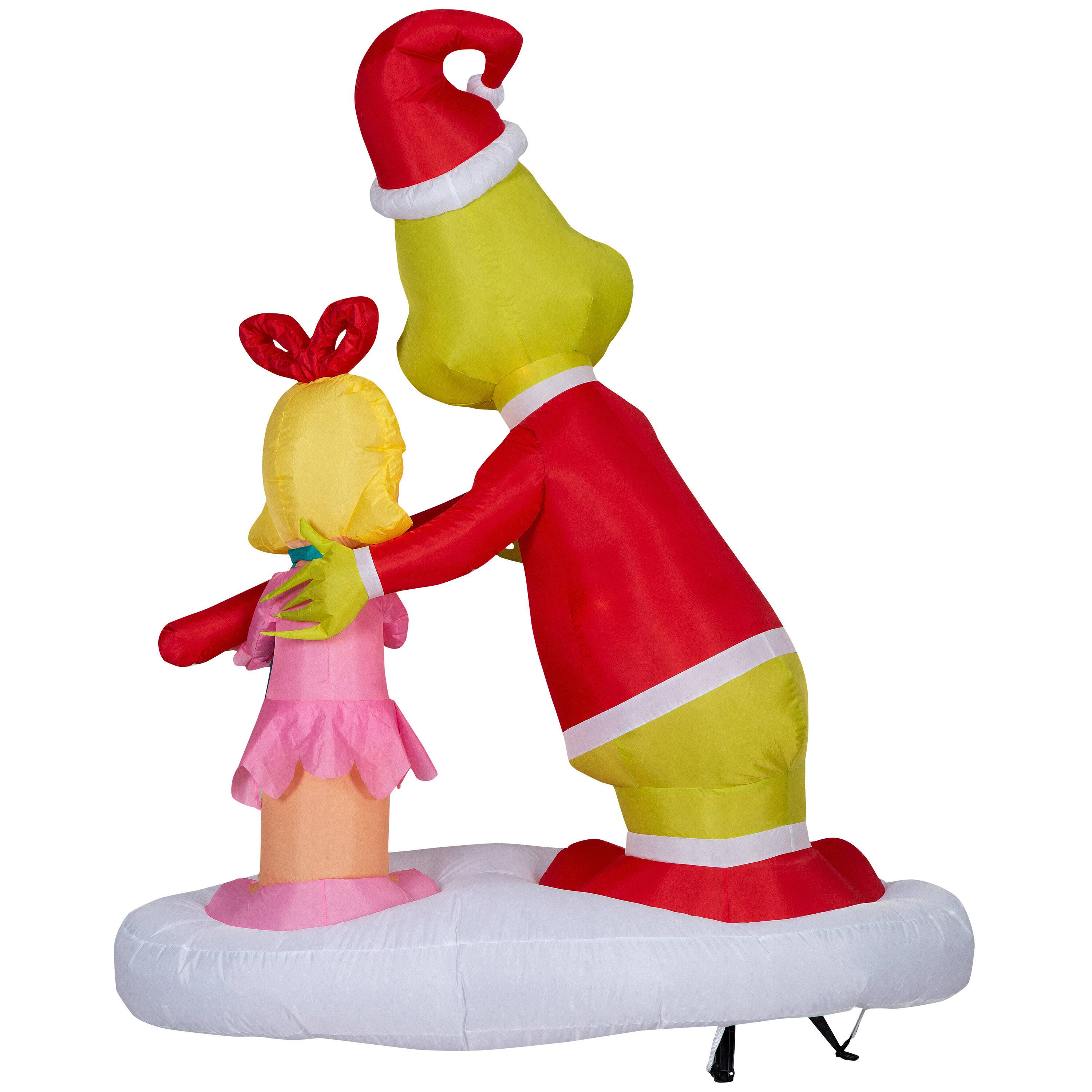 5.5ft. Airblown® Inflatable Christmas Grinch Passing Out Candy Canes to Cindy Lou