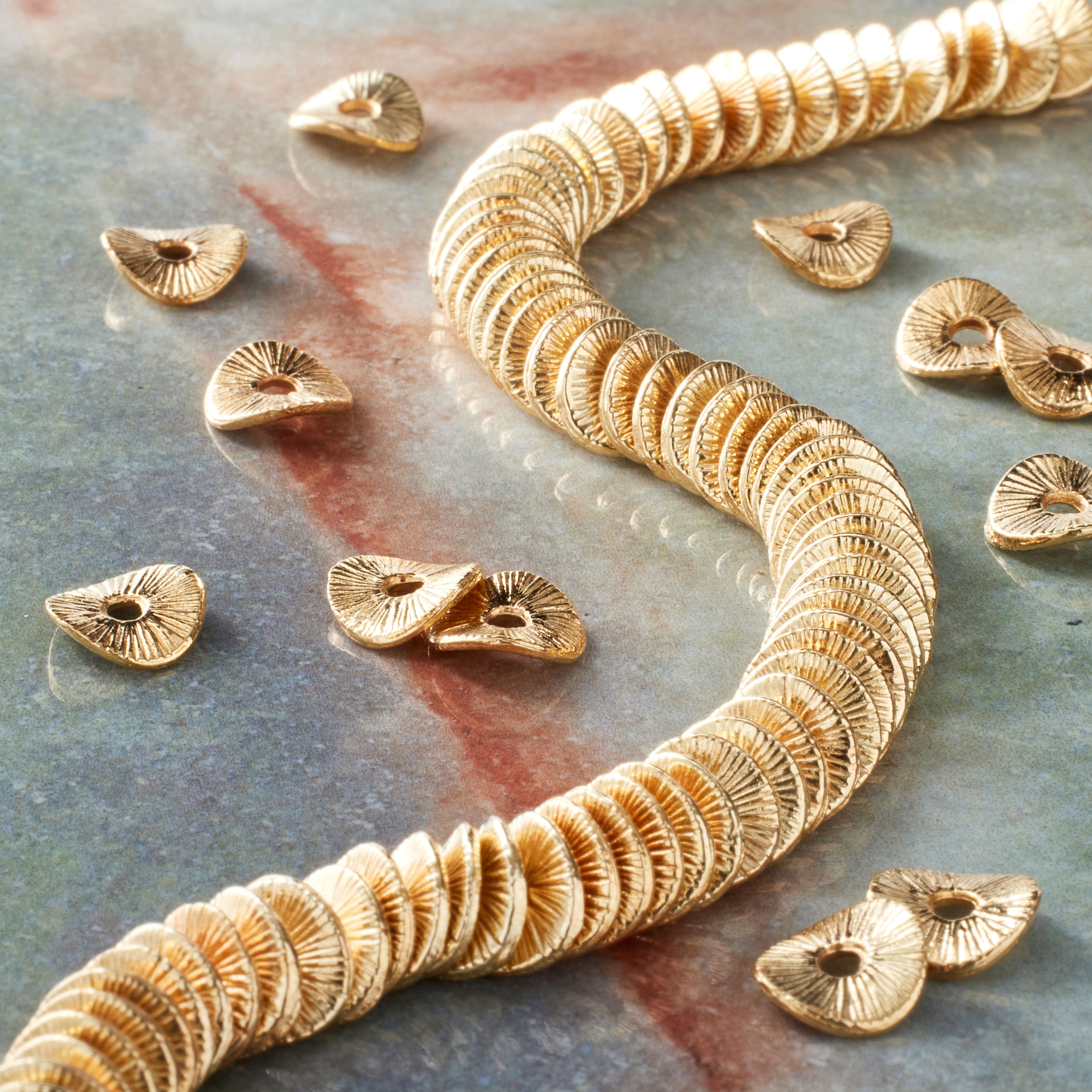12 Pack: Gold Metal Wavy Disc Beads by Bead Landing™