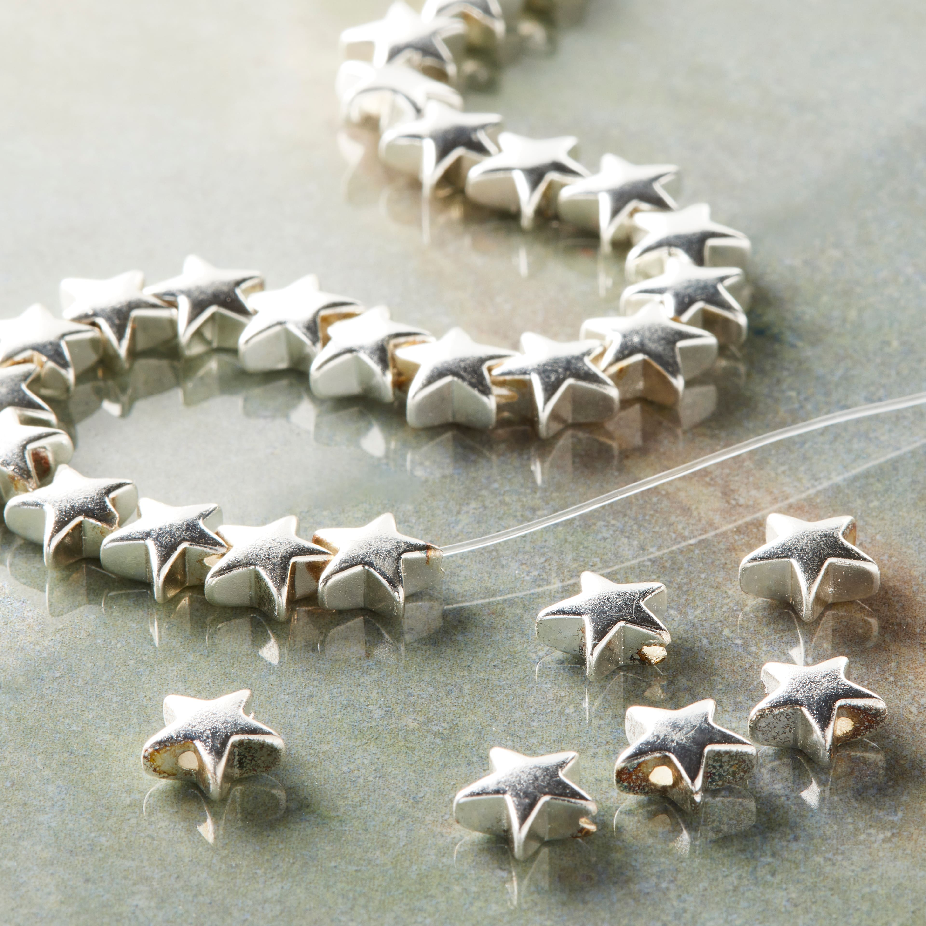12 Pack: Silver Hematite Star Beads, 8mm by Bead Landing™