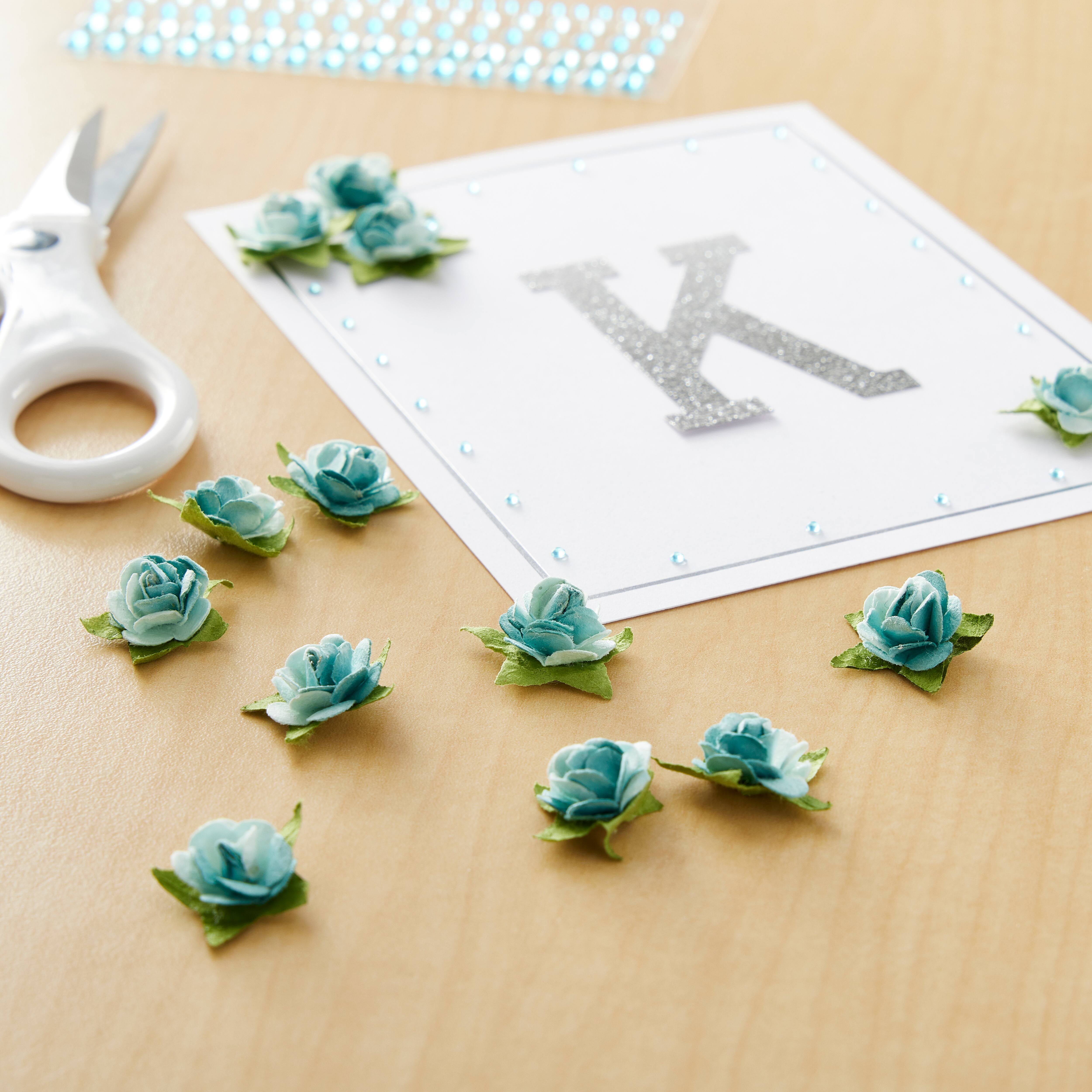 12 Packs: 24 ct. (288 total) Blue Rose Paper Flower Embellishments by Recollections™