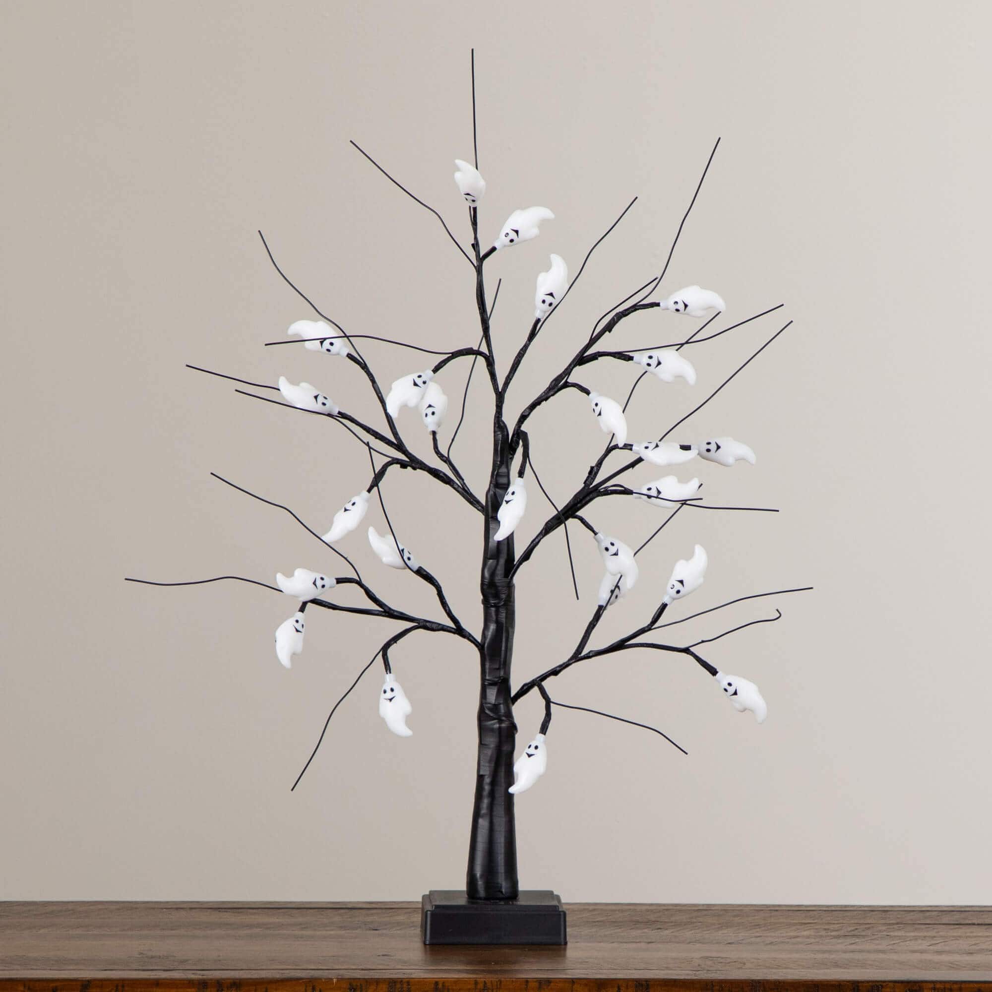 2ft. Pre-Lit Artificial Halloween Ghost Twig Tree with 24 Purple LED Lights