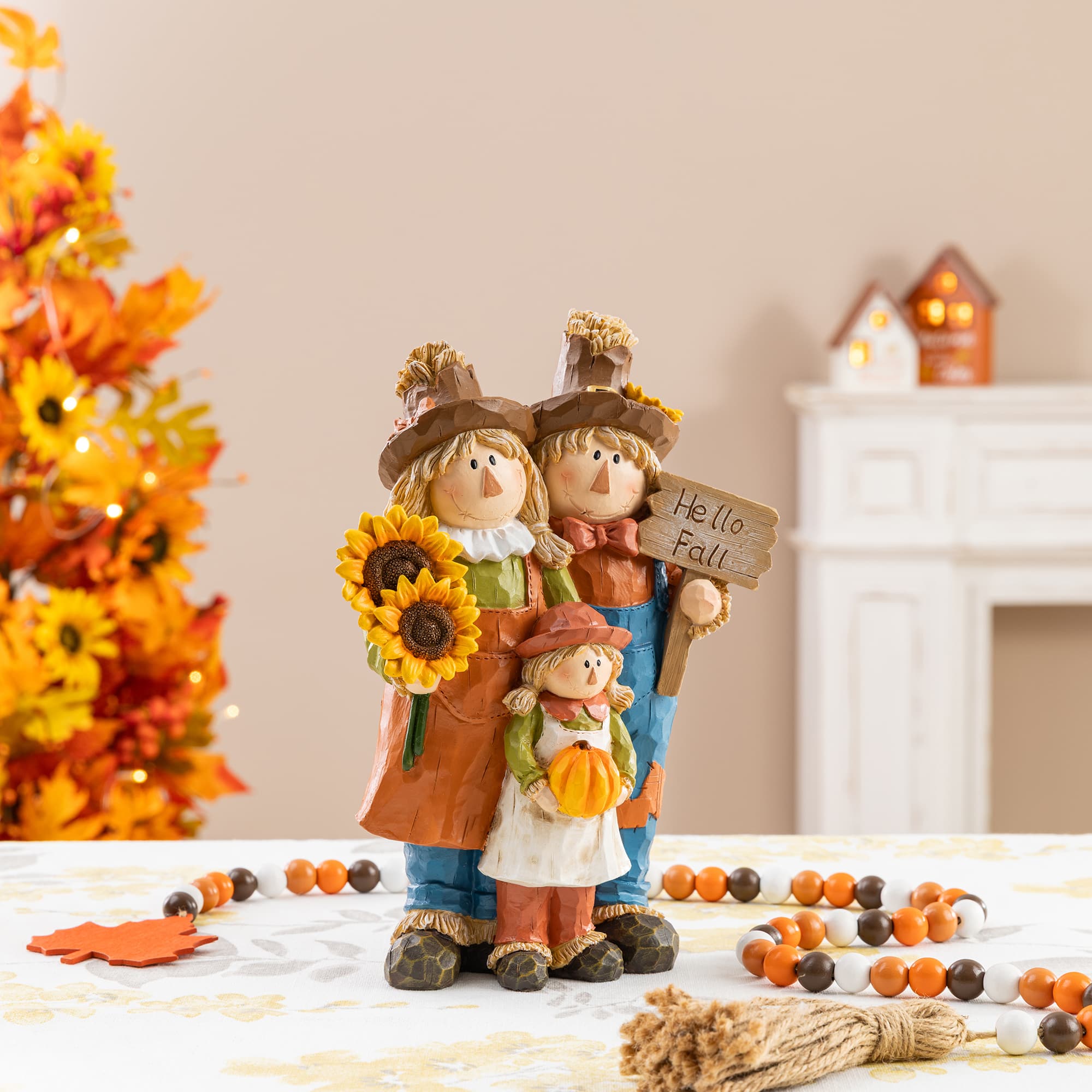 Glitzhome® 10.5" Fall Resin Scarecrow Family Table Decor