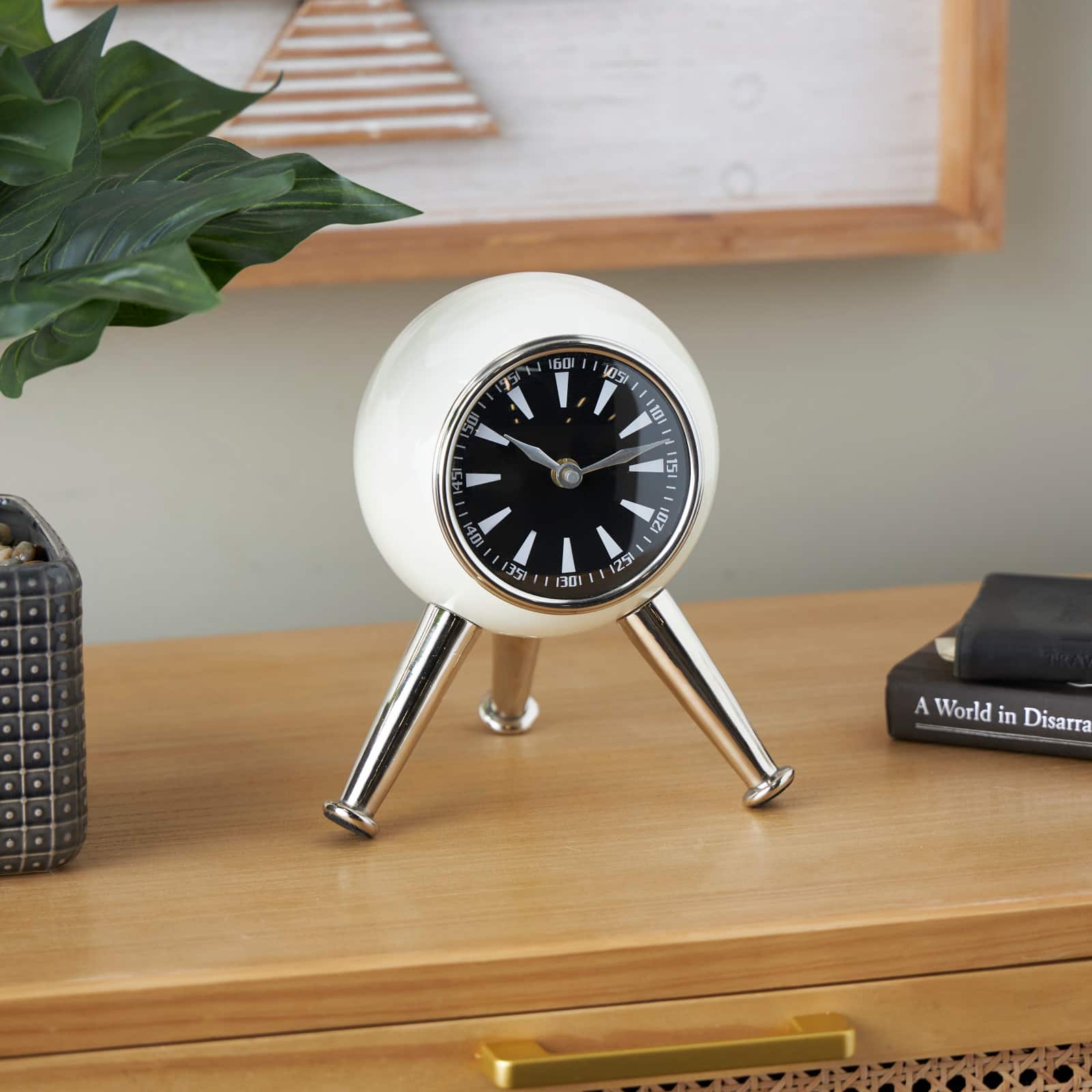 8.5" Silver Orb Metal Clock with Black Clockface & Silver Tripod Legs