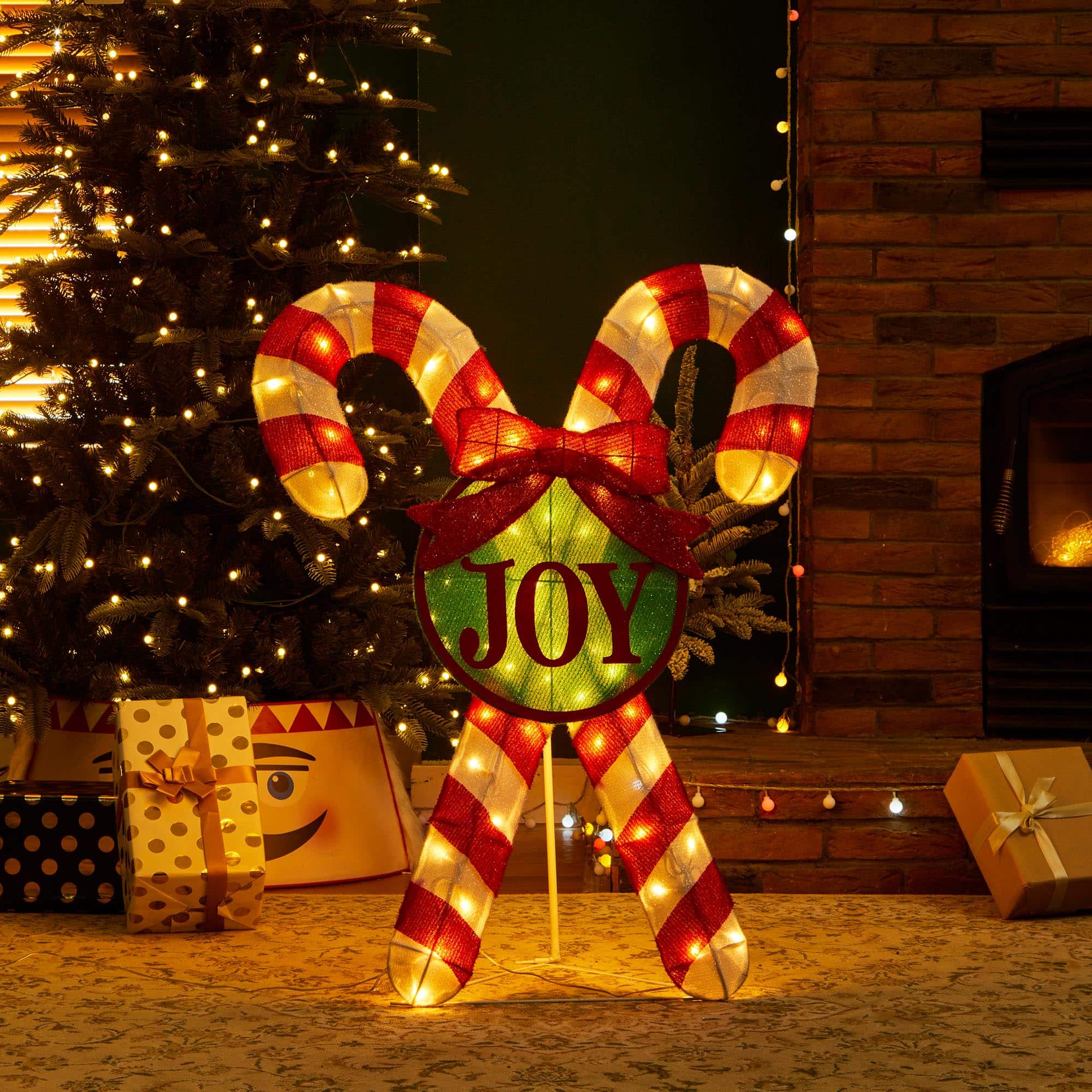 Glitzhome® 3ft. Lighted Christmas Candy Cane Outdoor Décor