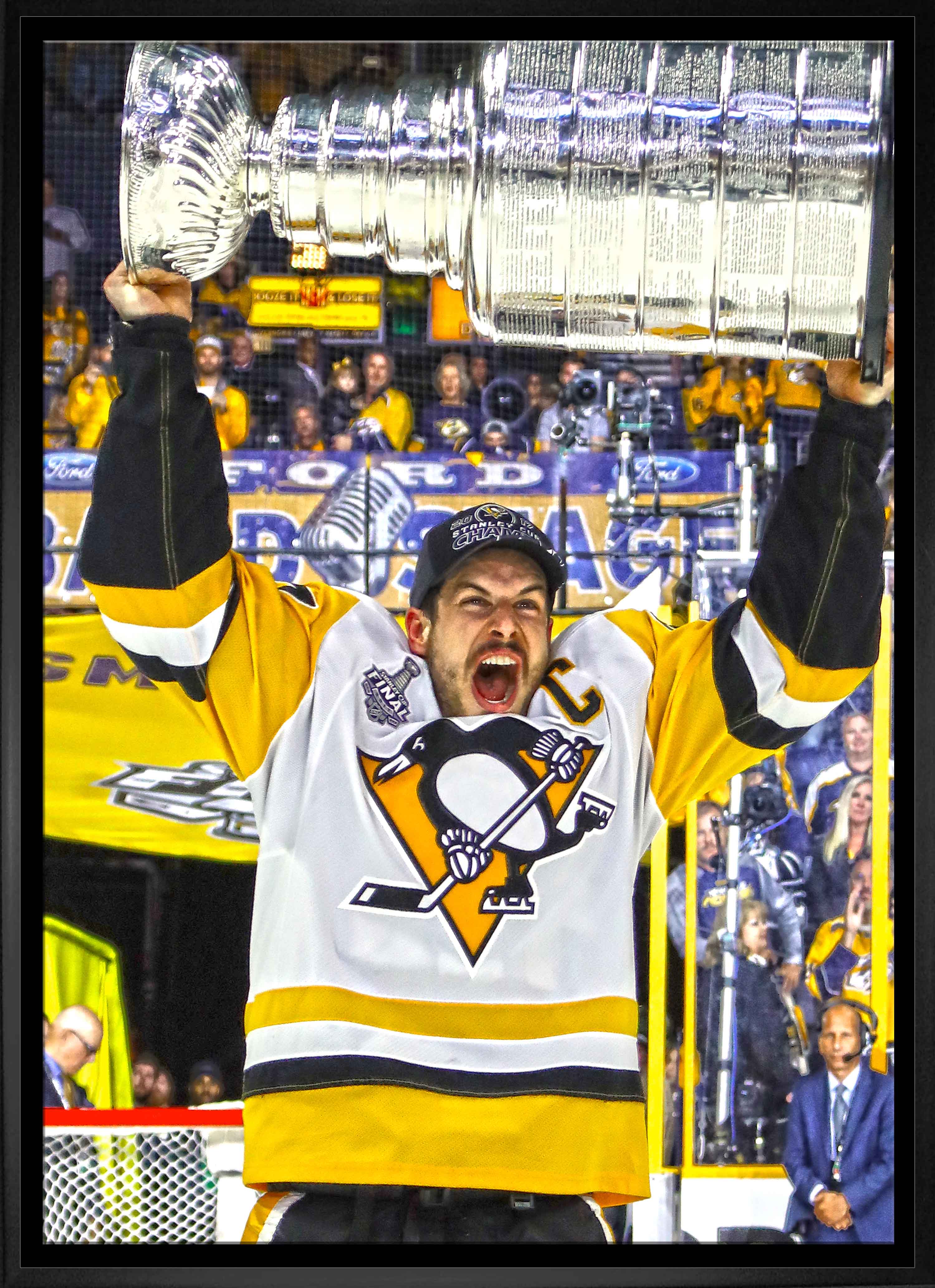 Sidney Crosby Pittsburgh Penguins Framed 20" x 29" Raising Stanley Cup Canvas 22.5" x 31.5"
