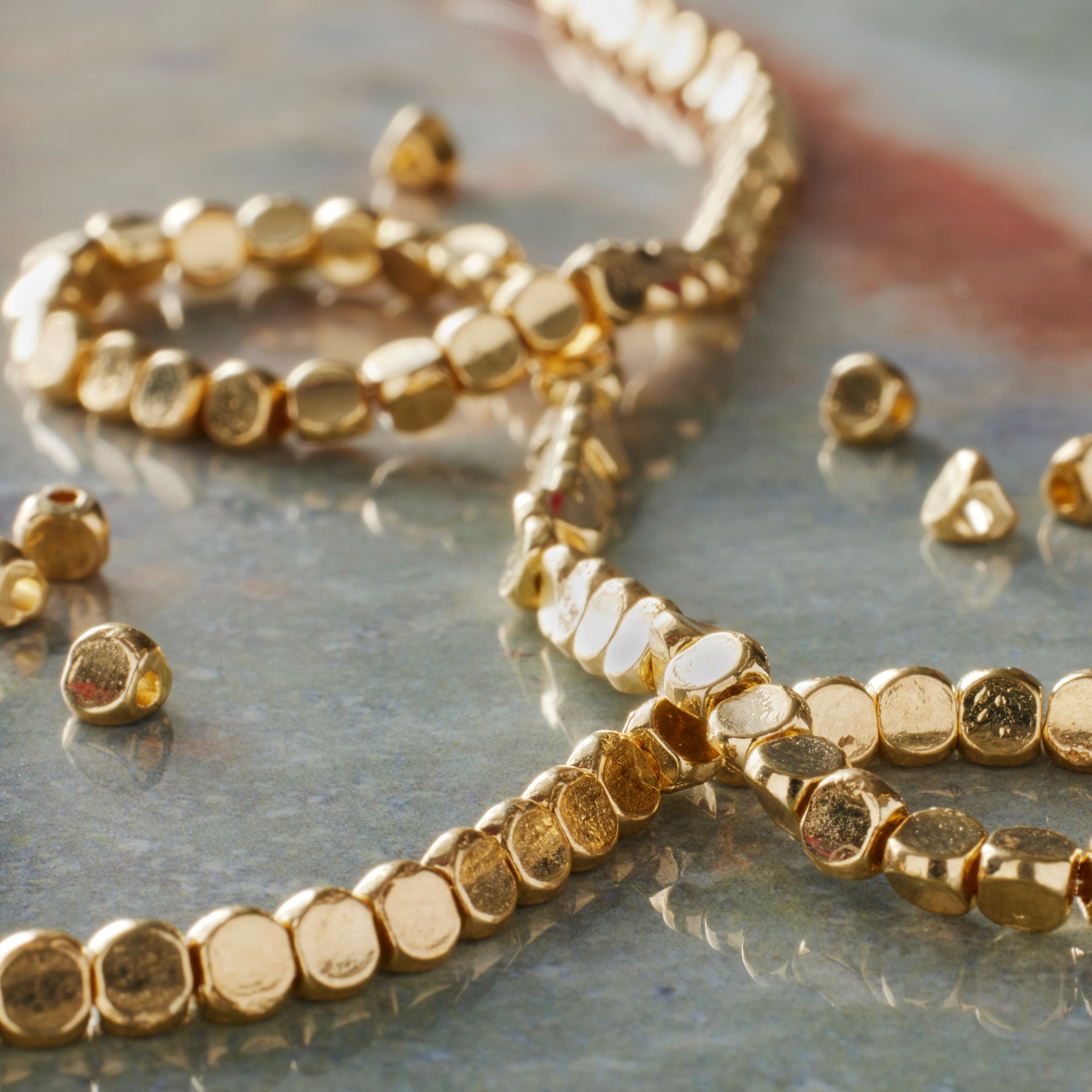 12 Pack: Gold Metal Irregular Shape Beads, 3mm by Bead Landing™