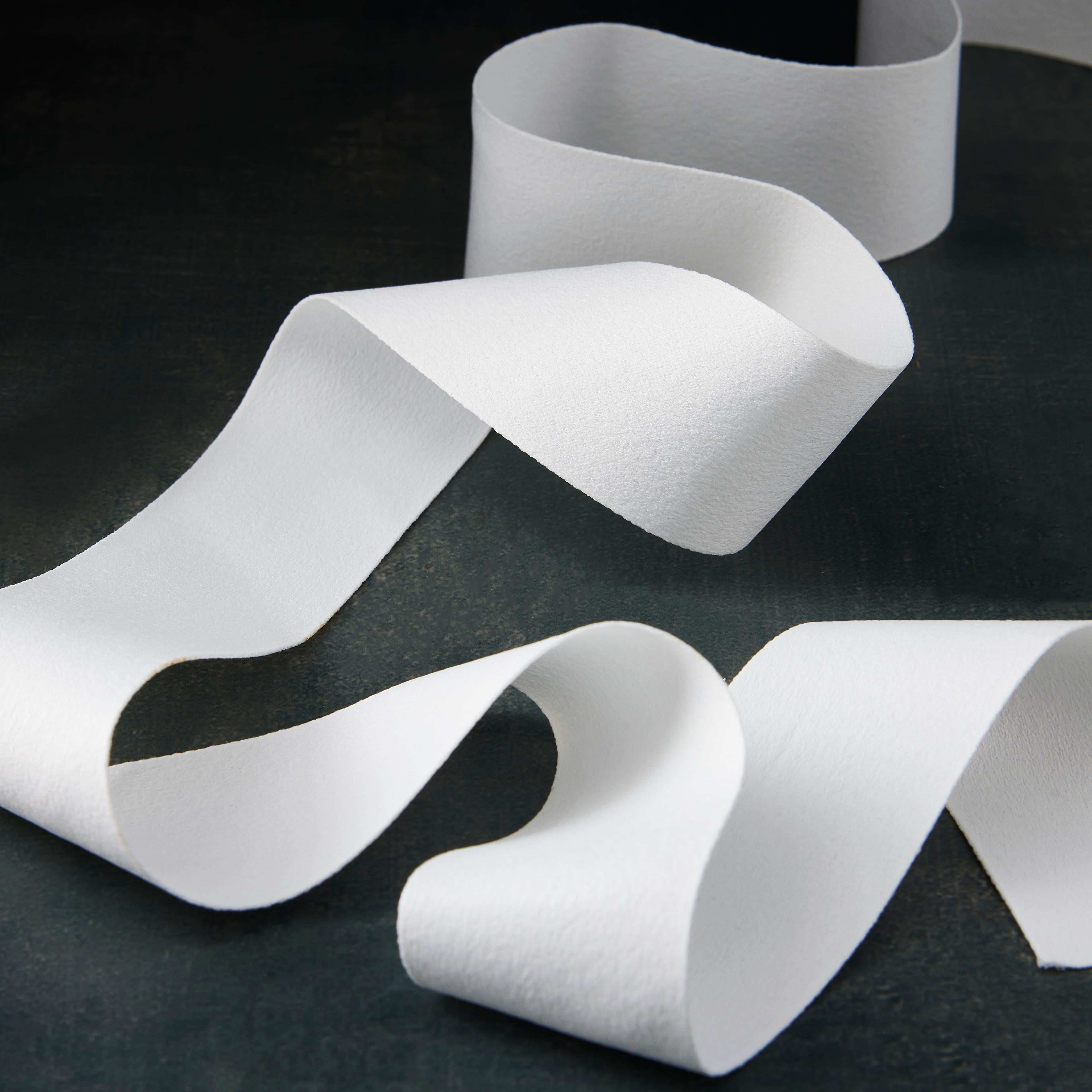 12 Pack: 1.5" x 3yd. Faux Suede Ribbon by Celebrate It™