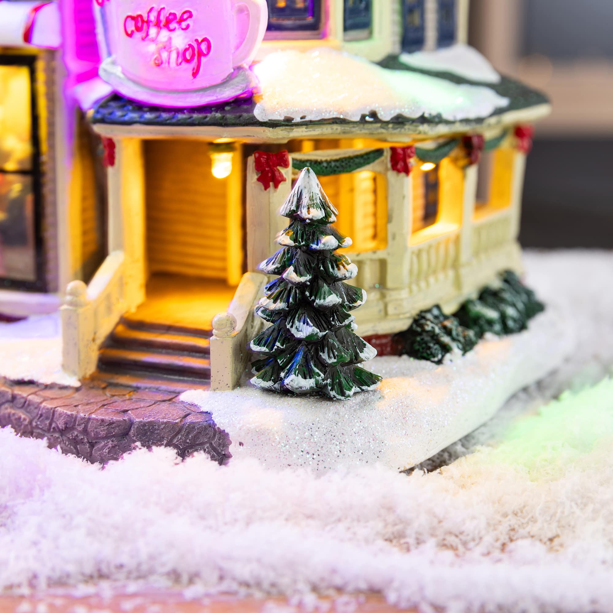 Glitzhome® 8.5" Lighted Christmas Coffee Shop Musical Resin Village with Timer