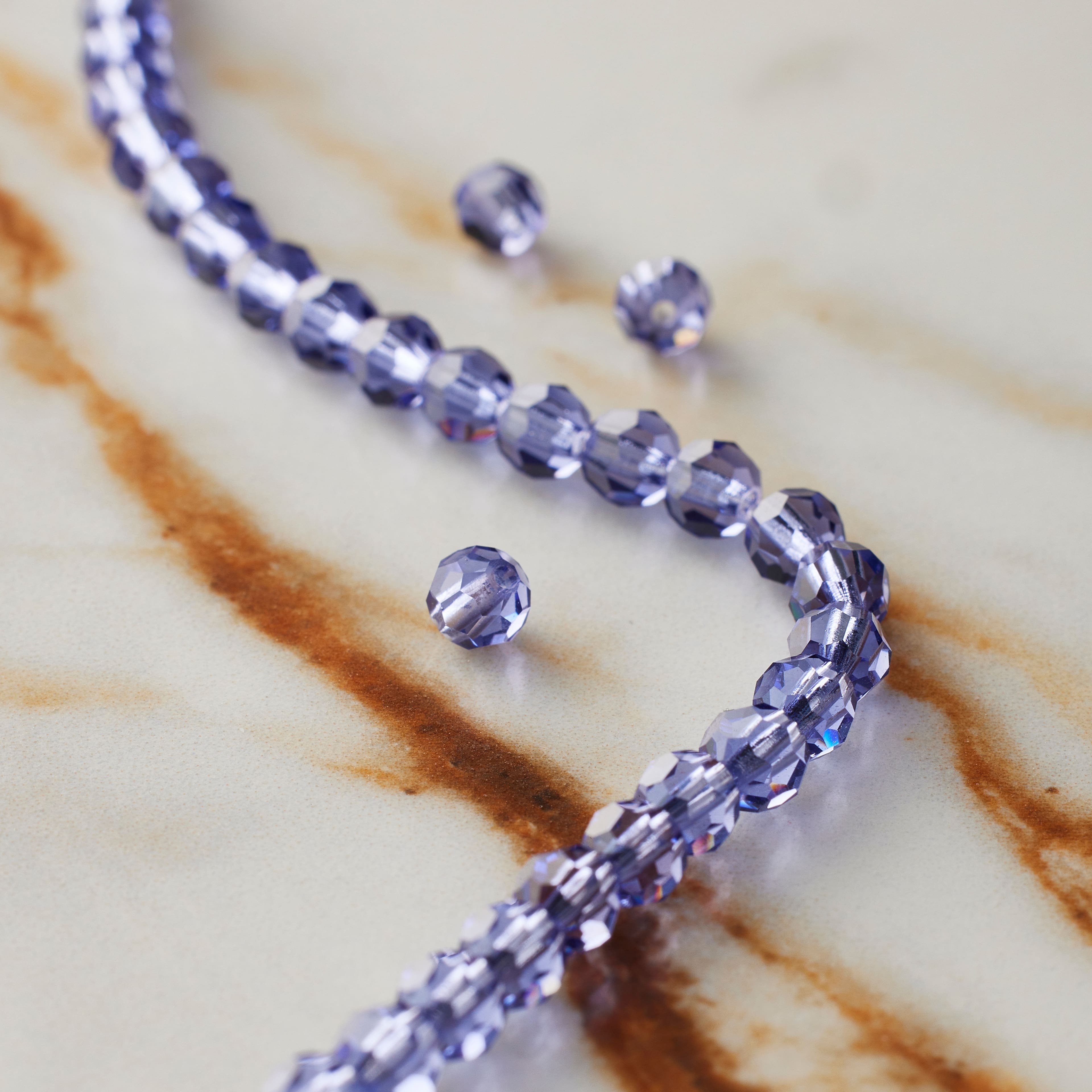 12 Packs: 31 ct. (372 total) Preciosa Glass Crystal Round Beads, 4mm by Bead Landing™