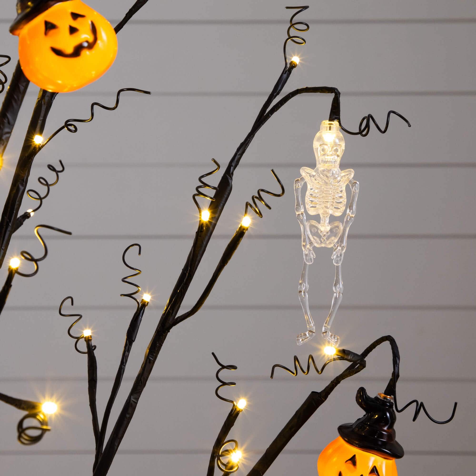 4ft. Pre-Lit Artificial Halloween Pumpkins and Skulls Ornament Tree with 64 Warm White LED Lights
