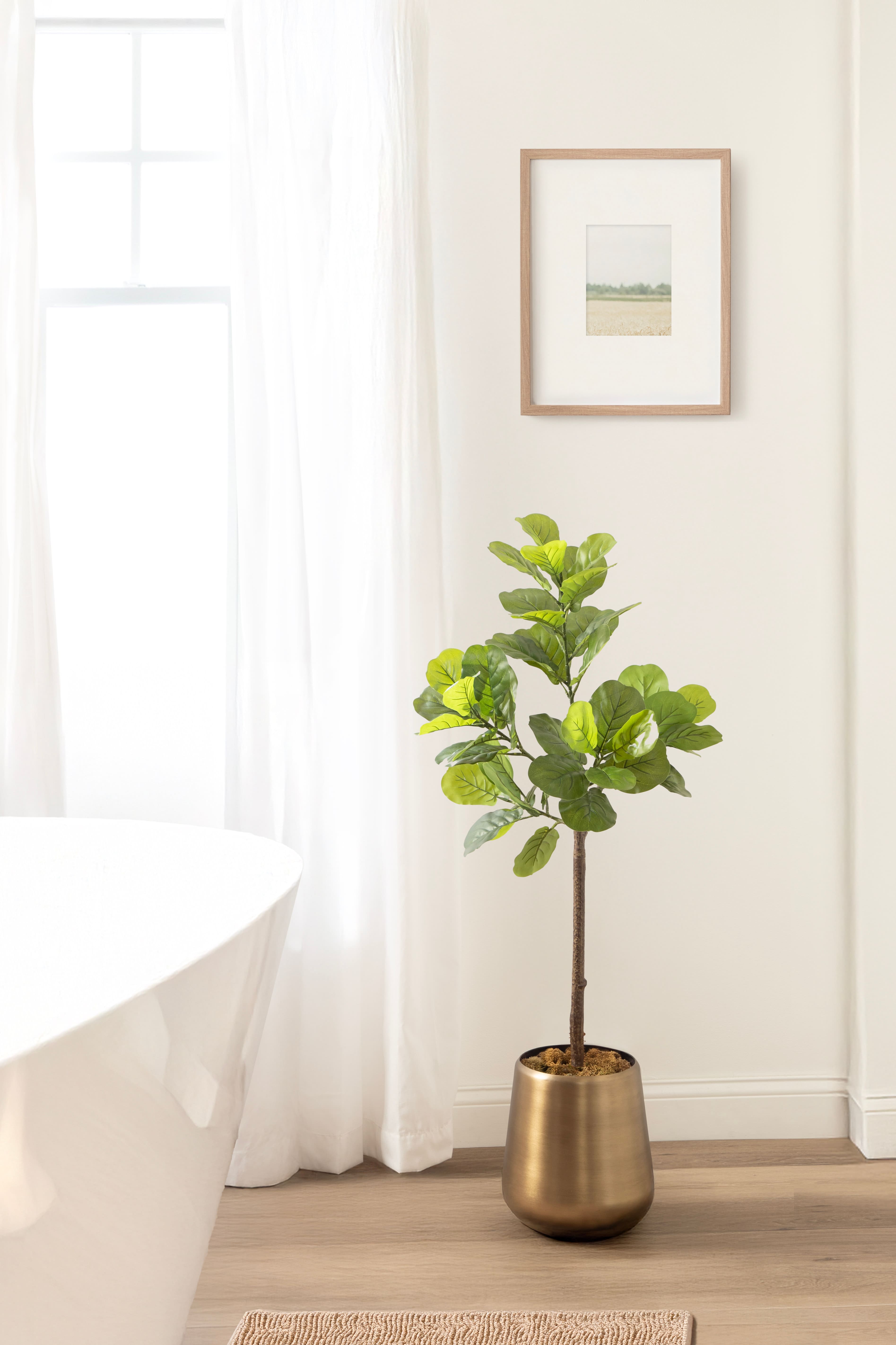 Kate and Laurel Fidmont 4ft. Faux Fiddle Fig Tree with Portell Planter