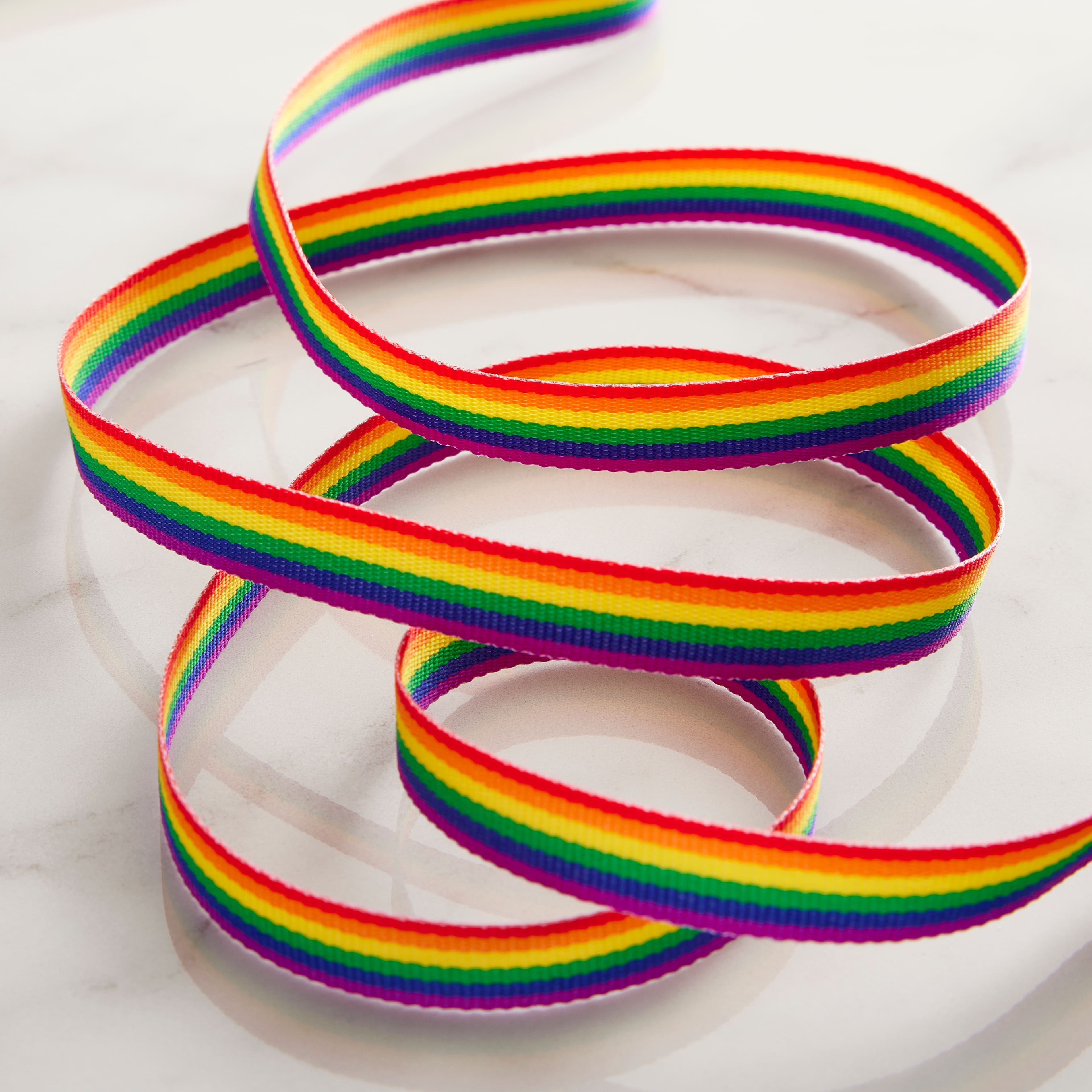 12 Pack: 3/8" x 7yd. Grosgrain Rainbow Ribbon by Celebrate It™