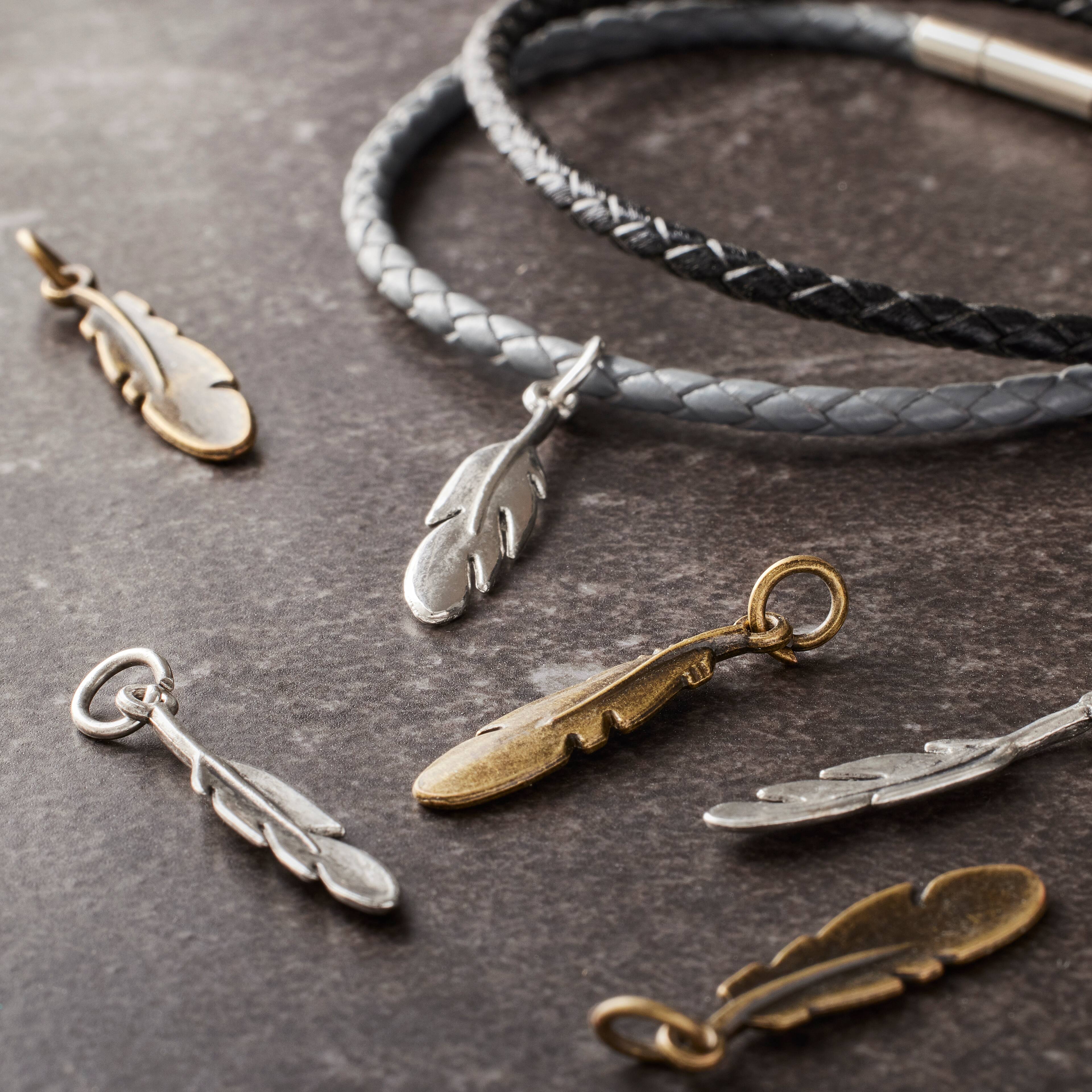 12 Packs: 16 ct. (192 total) Charmalong™ Feather Charms by Bead Landing™