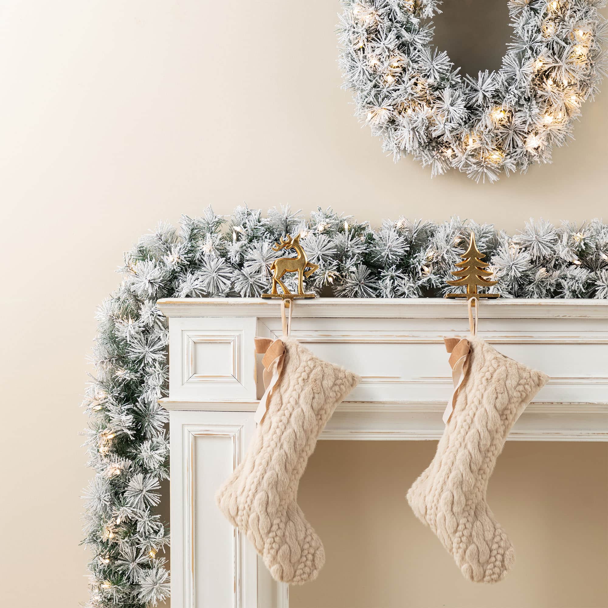 Glitzhome® 6ft Pre-Lit Snow Flocked Greenery Pine Christmas Garland with Timer, 2ct.