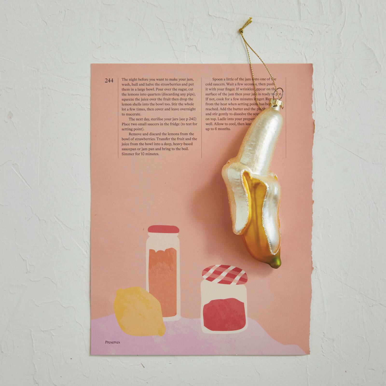 Hello Honey® 5.5" Yellow & Cream Glass Peeled Banana Ornament with Glitter