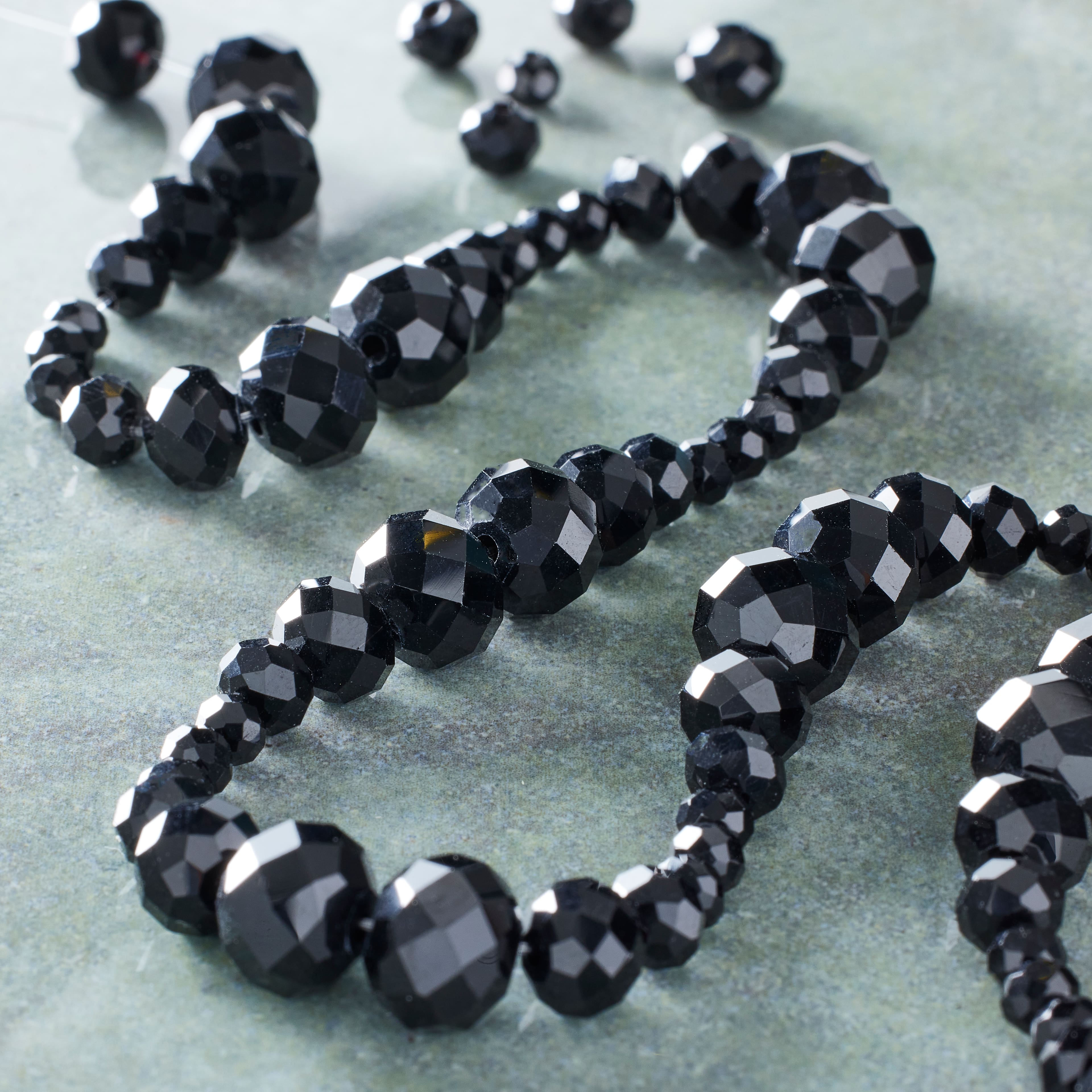 12 Packs: 4 ct. (48 total) Black Faceted Glass Round Beads by Bead Landing™