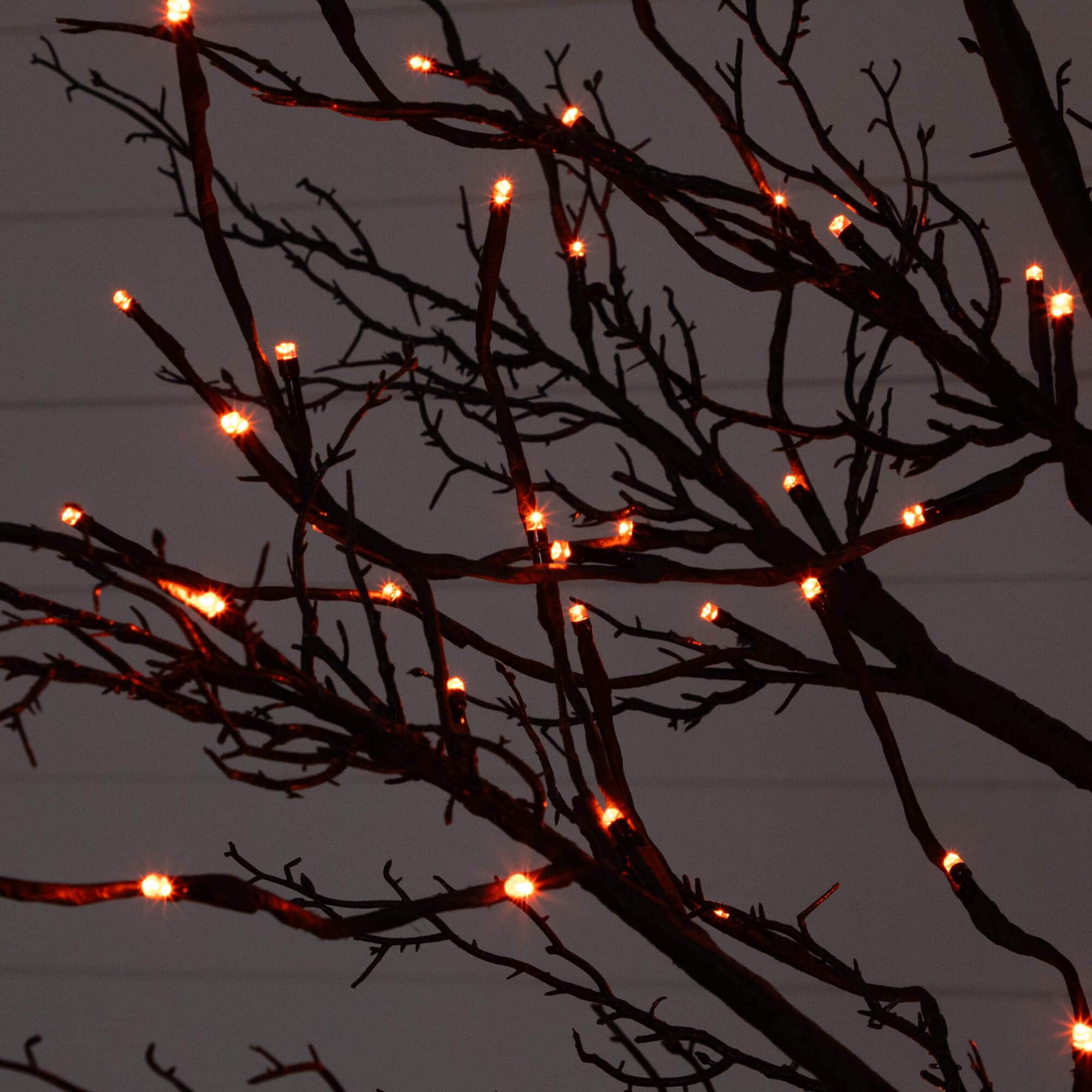 8ft. Pre-Lit Halloween Deluxe Black Twig Artificial Tree with 216 Orange & Purple LED Lights