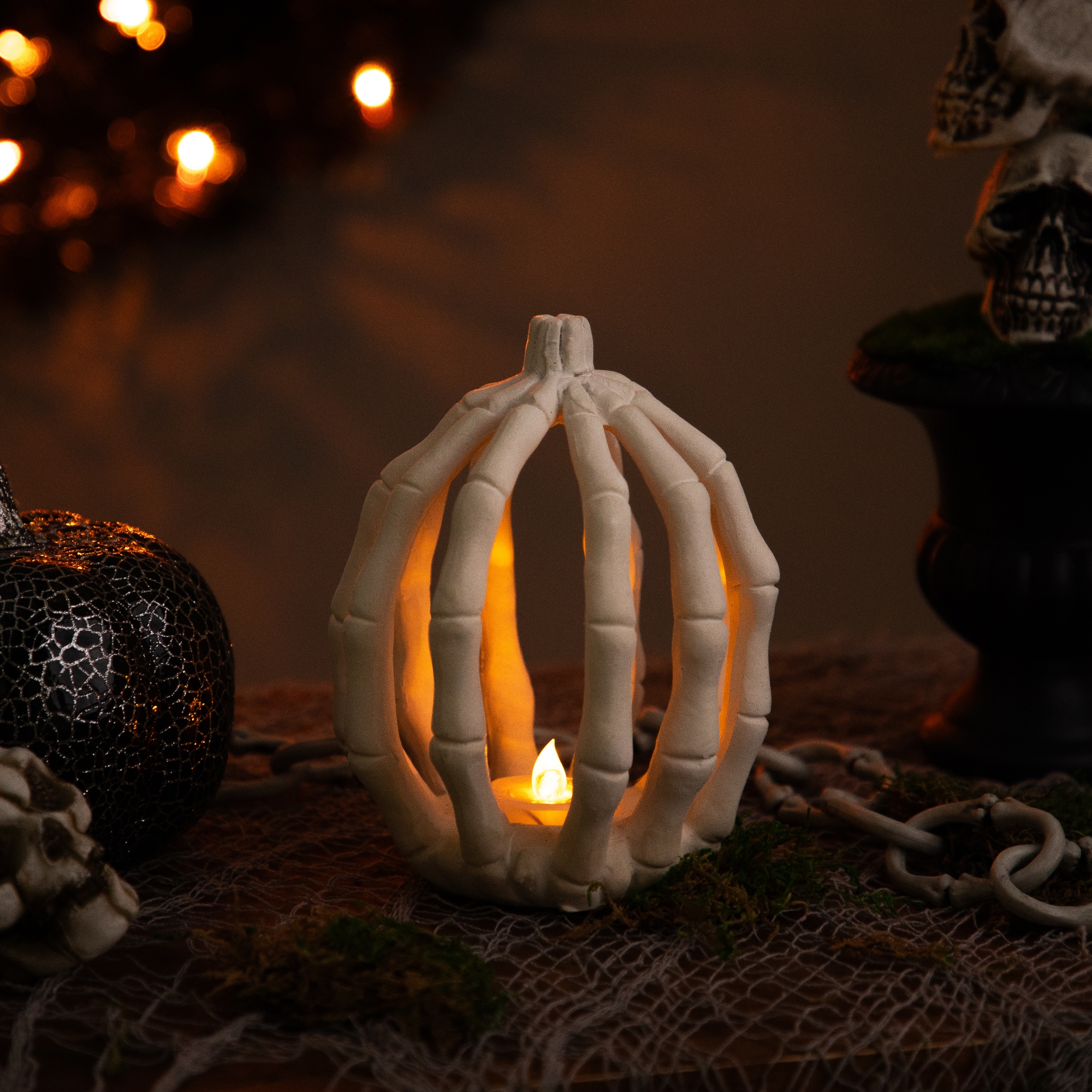 35246849 6.25 in. Battery Operated LED Lighted Skeleton Pumpkin Halloween Decoration