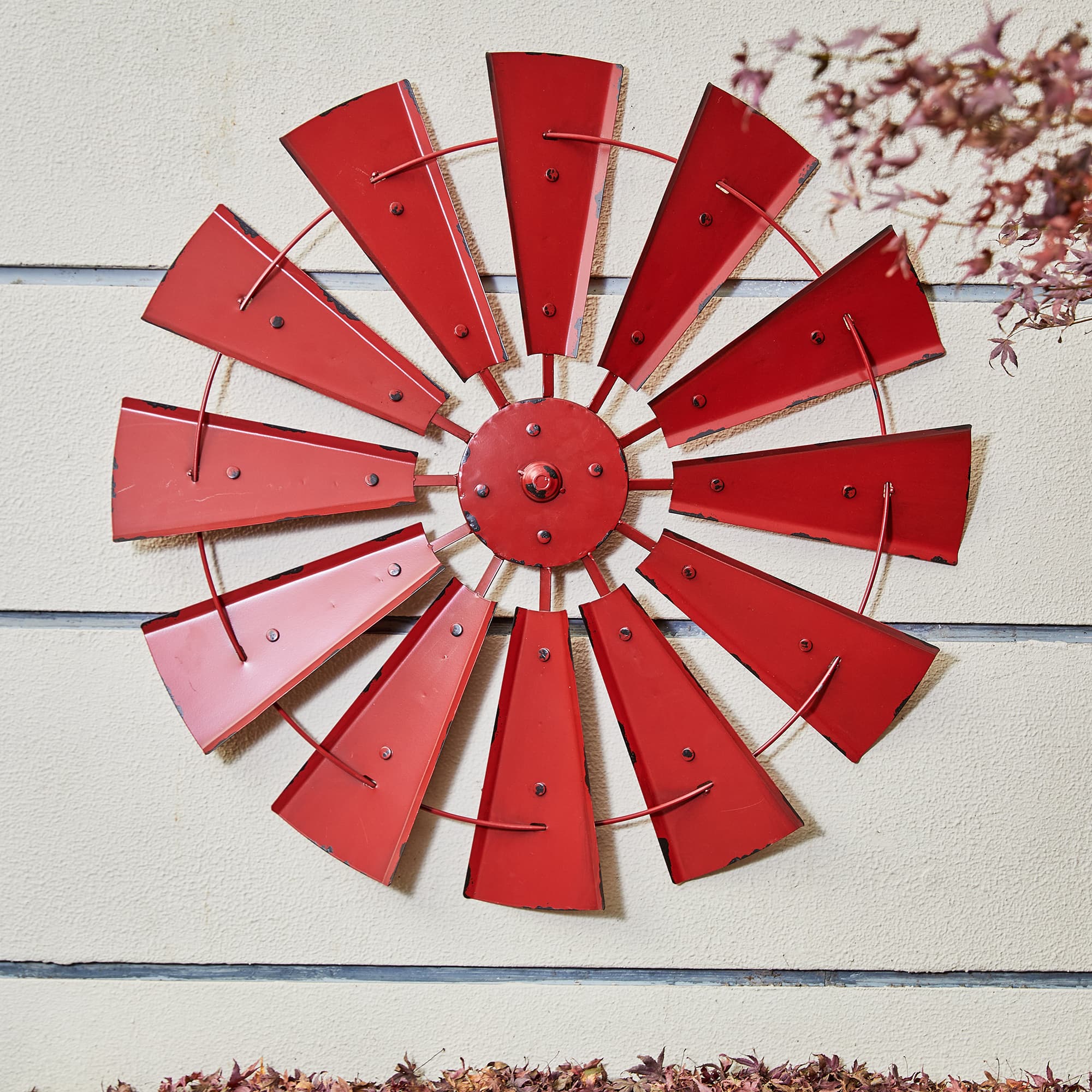 Glitzhome® 28.5" Red Metal Wind Spinner Wall Décor