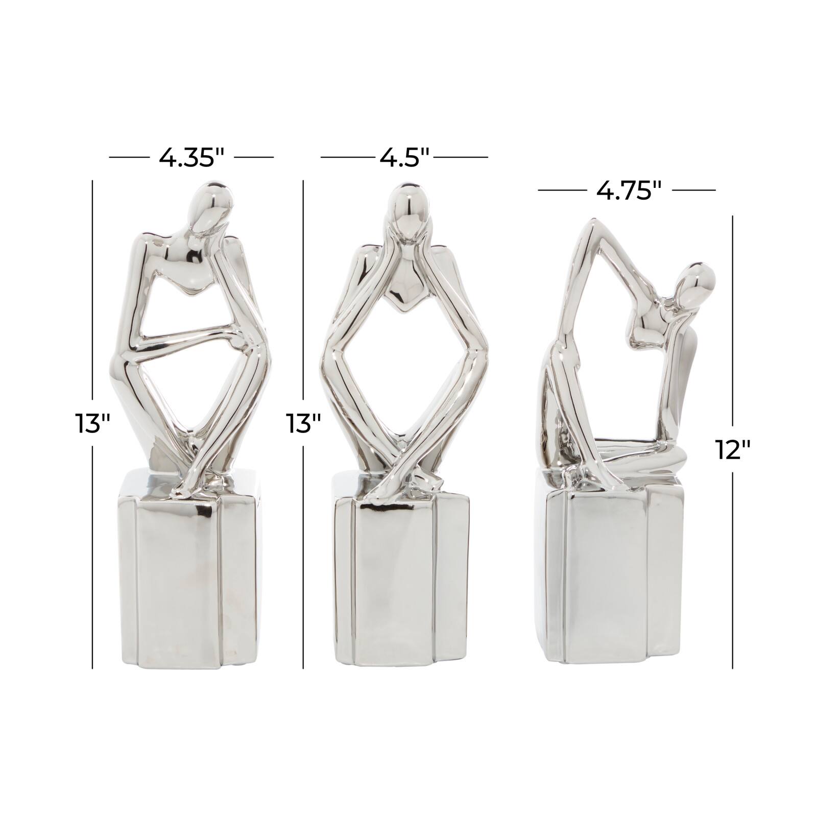 CosmoLiving by Cosmopolitan Silver Ceramic Sculpture Set