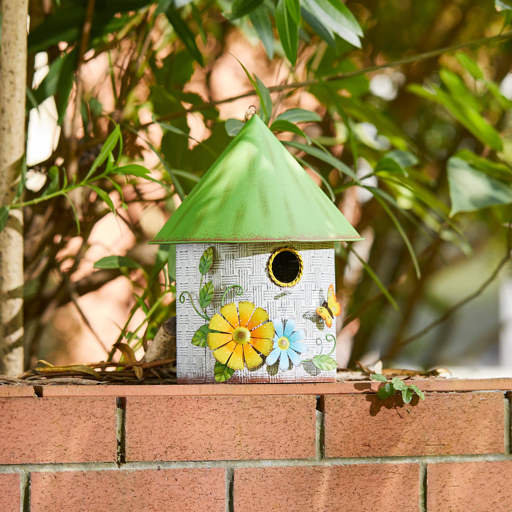Glitzhome® 11" Distressed Metal Birdhouse with 3D Flowers & Butterfly