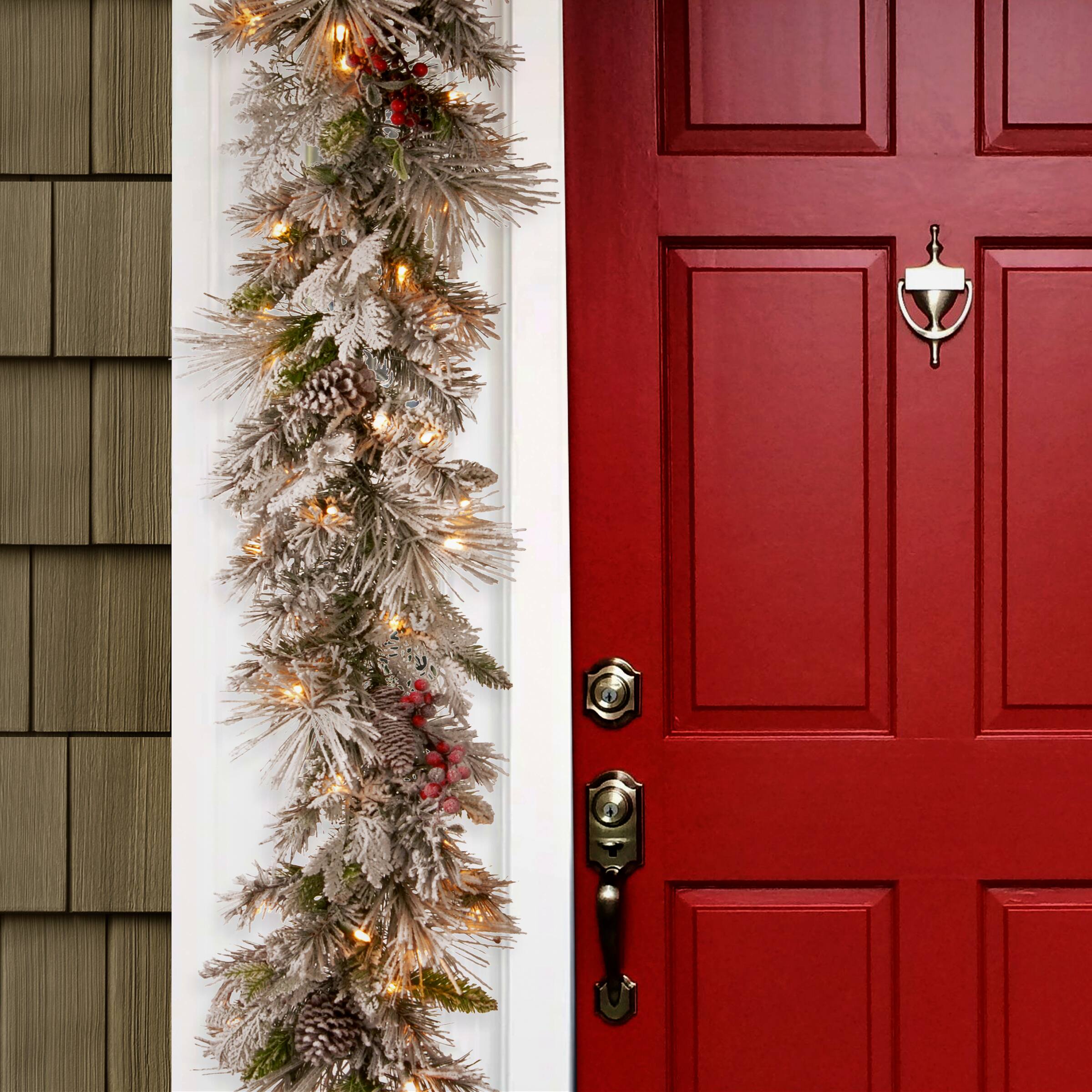 9ft. Pre-lit Snowy Bedford Pine Artificial Christmas Garland with Cedar Leaves, Red Berries, Mixed Cones & 70 Warm White Battery Operated LED Lights w/Timer