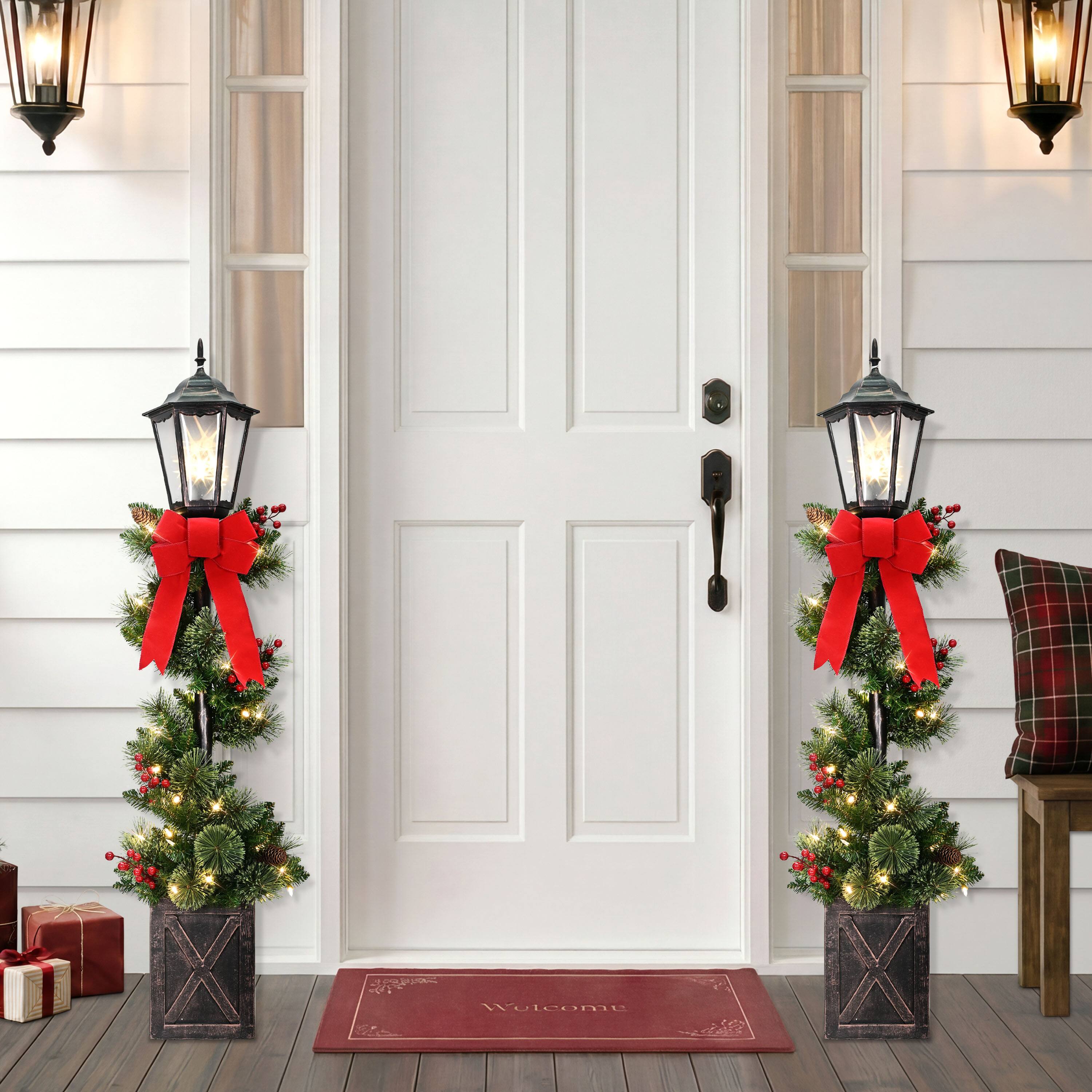 Puleo International 4ft. Pre-Lit Pinecones, Berries & Red Bow Artificial Spiral Lamp Post Trees, 2ct.