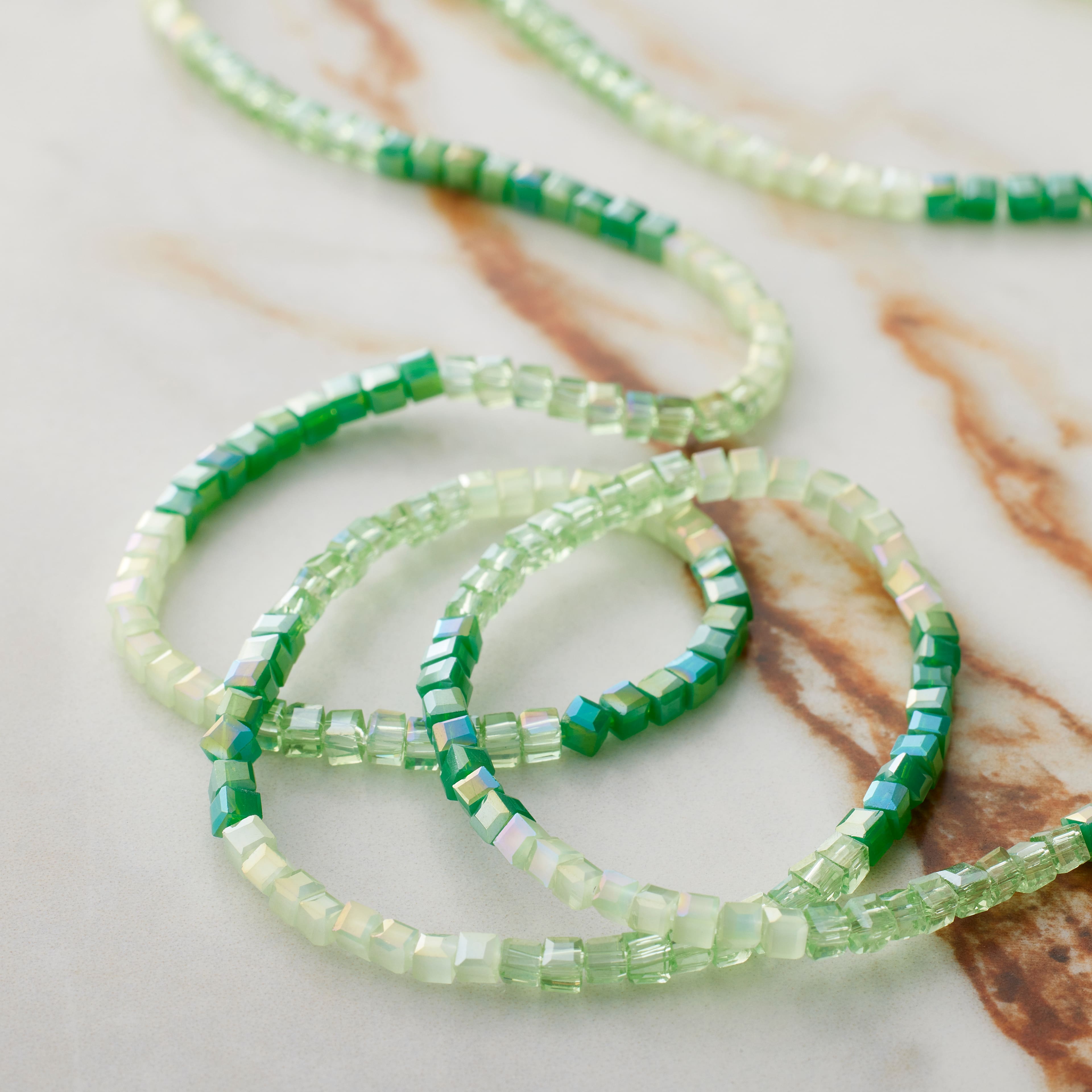 12 Pack: Green Ombre Faceted Glass Cube Beads, 2mm by Bead Landing™