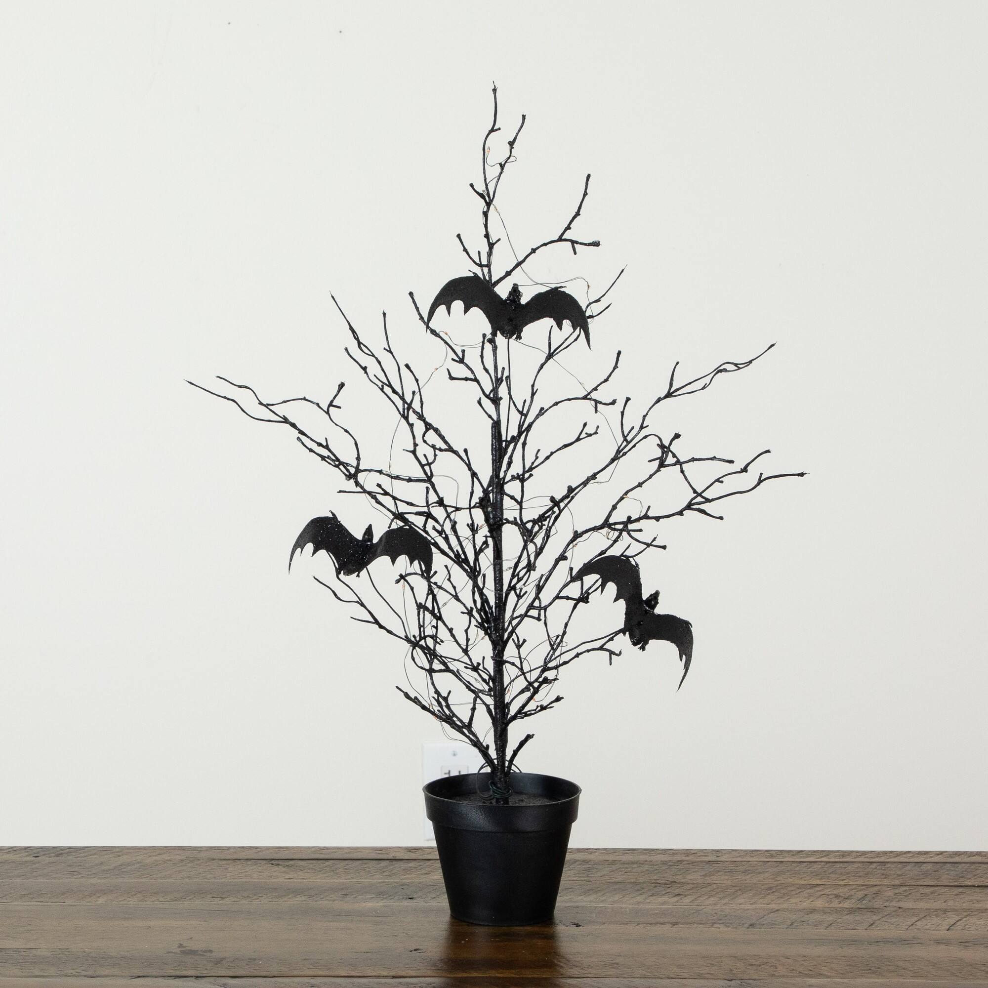 2ft. Pre-Lit Artificial Black Spooky Twig Tree with Bats and 40 Orange & Purple LED Lights