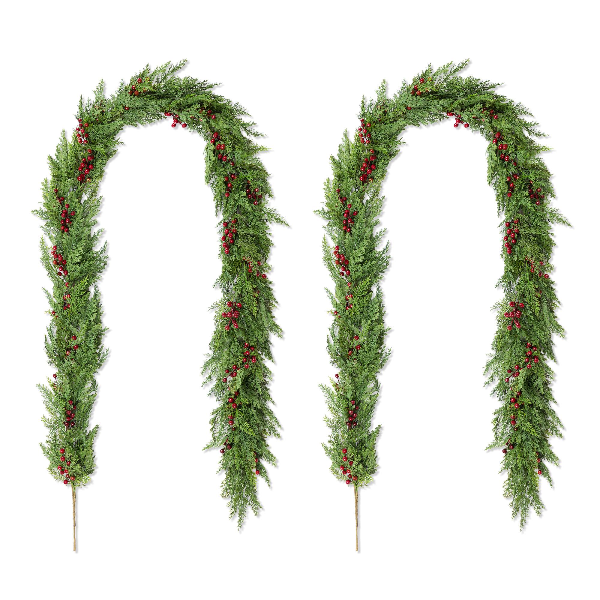 Glitzhome® 9ft. Christmas Greenery PE Dripping Cedar Garland with Red Berries, Set of 2