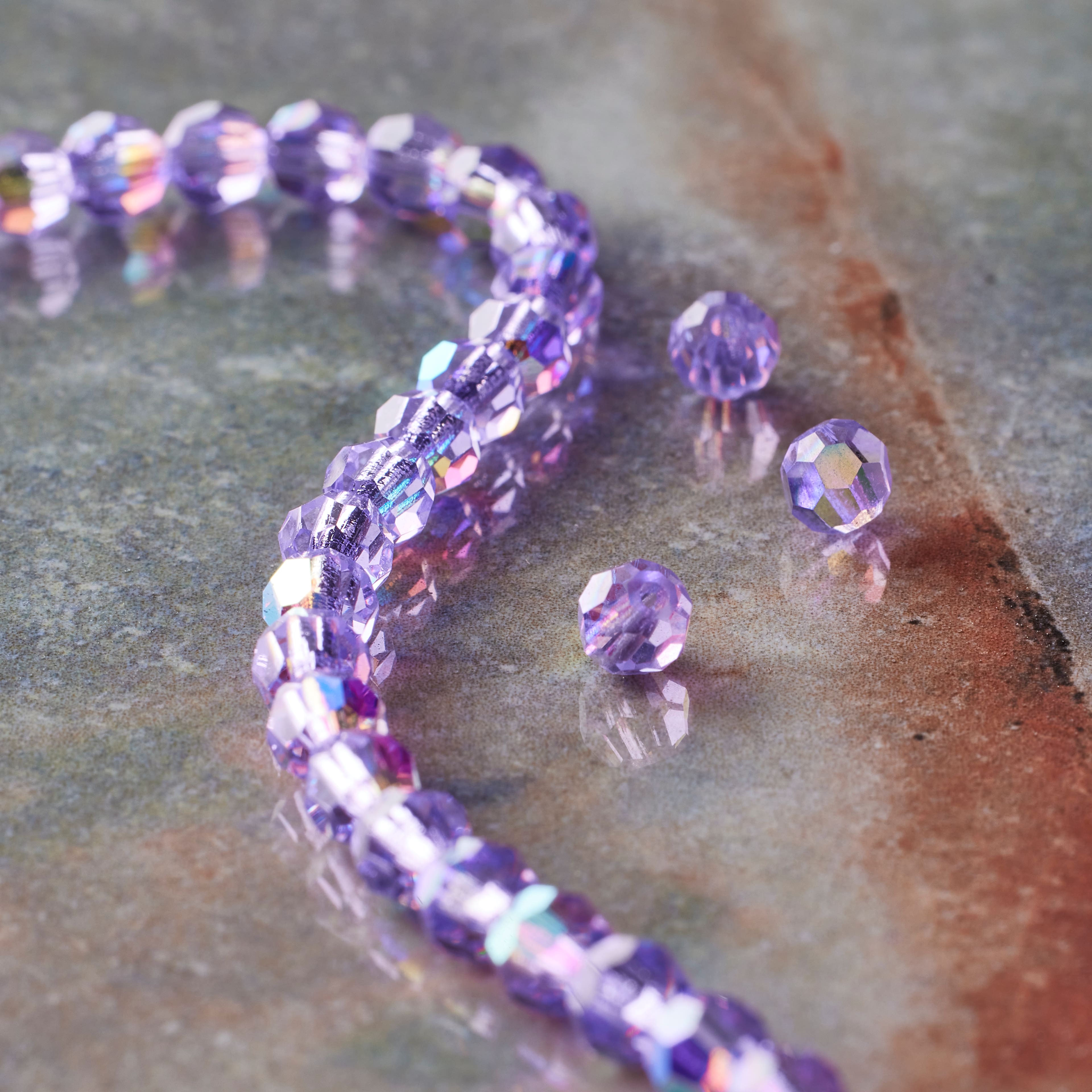 12 Packs: 31 ct. (372 total) Preciosa Glass Crystal Round Beads, 4mm by Bead Landing™