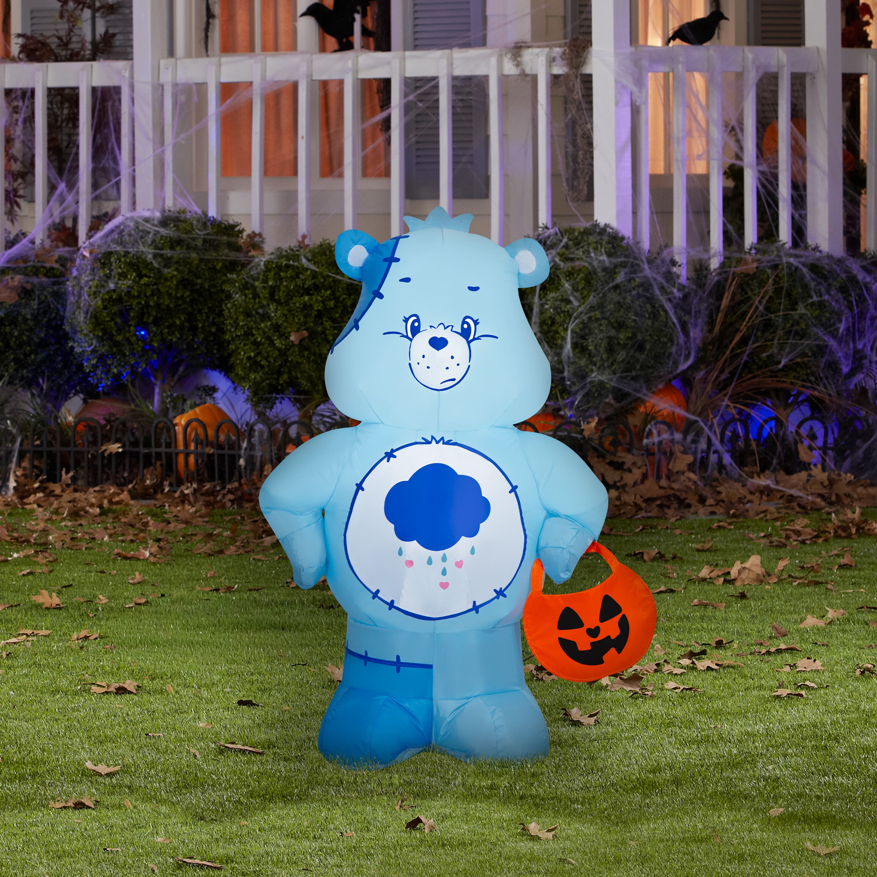 3.2ft. Airblown® Inflatable Care Bears Grumpy Bear with Jack-o’-Lantern Candy Basket Yard Décor