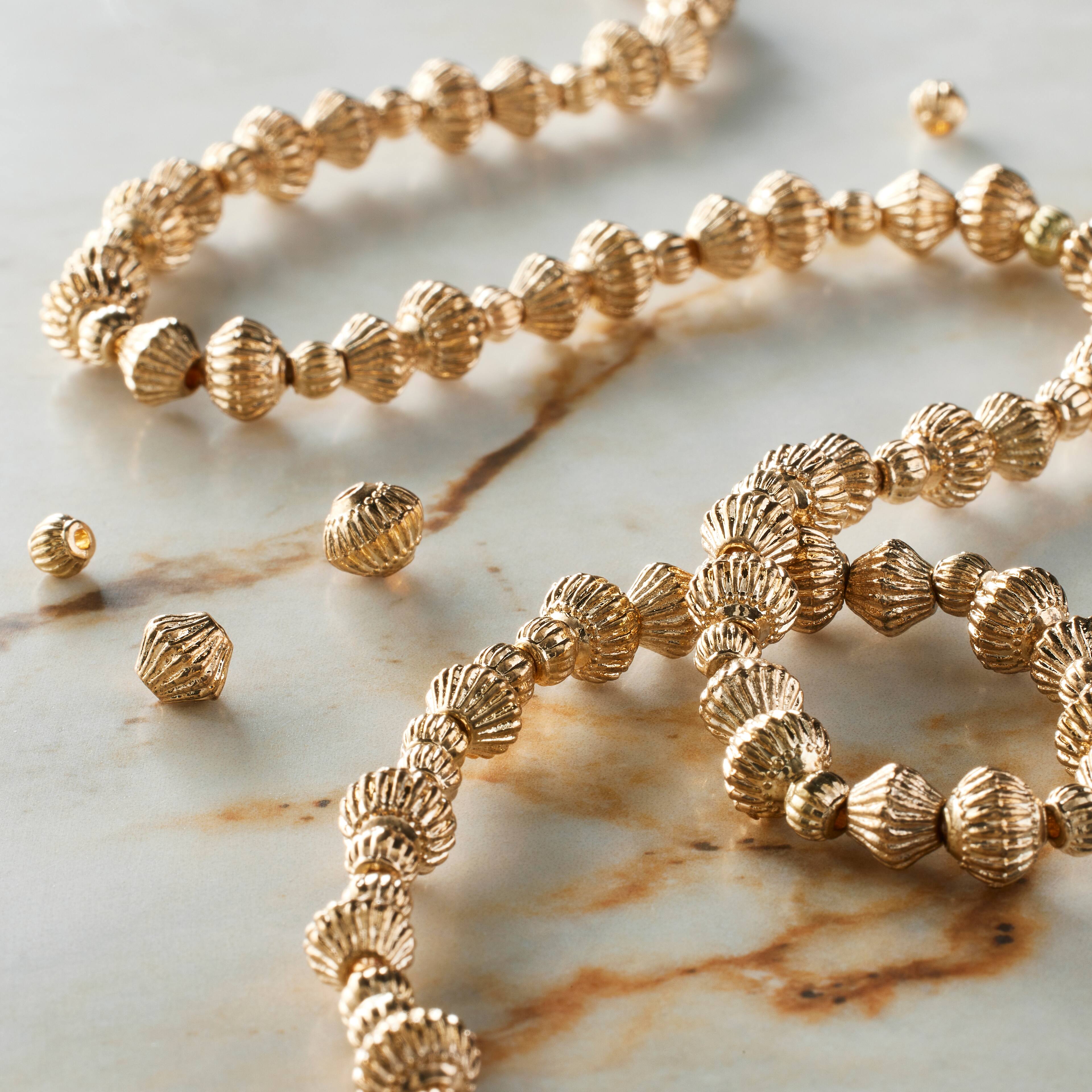 12 Packs: 96 ct. (1,176 total) Gold Mixed Metal Bead Value Pack by Bead Landing™