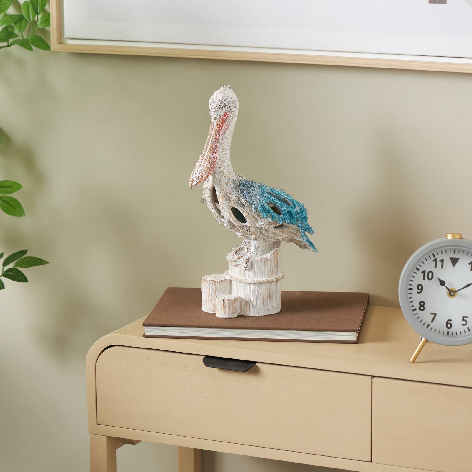 13.25" Pelican Textured Decorative Sculpture with Feathers & Round Blocks