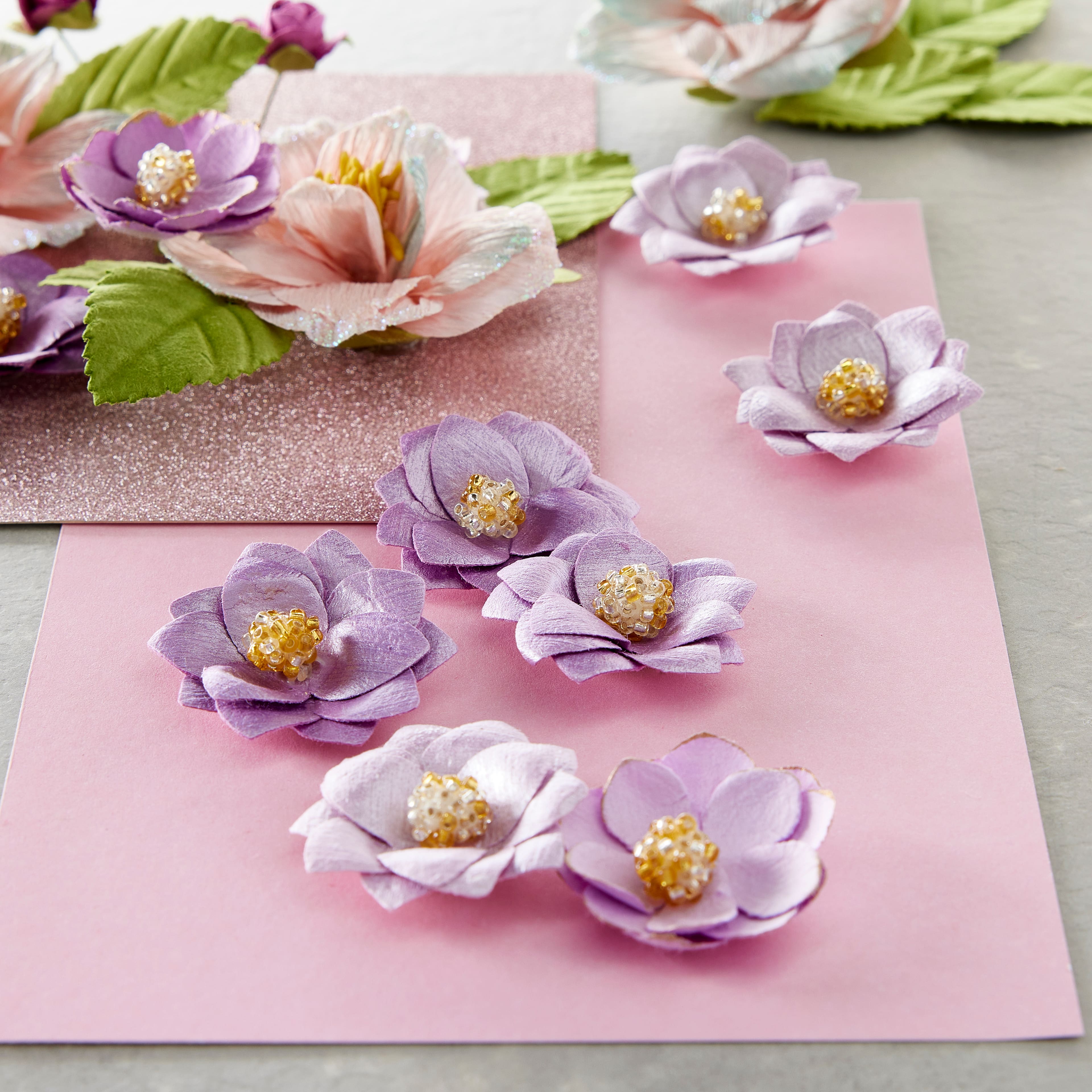 12 Packs: 12 ct. (144 total) Signature™ Gold Tipped Purple Flower Embellishments by Recollections™