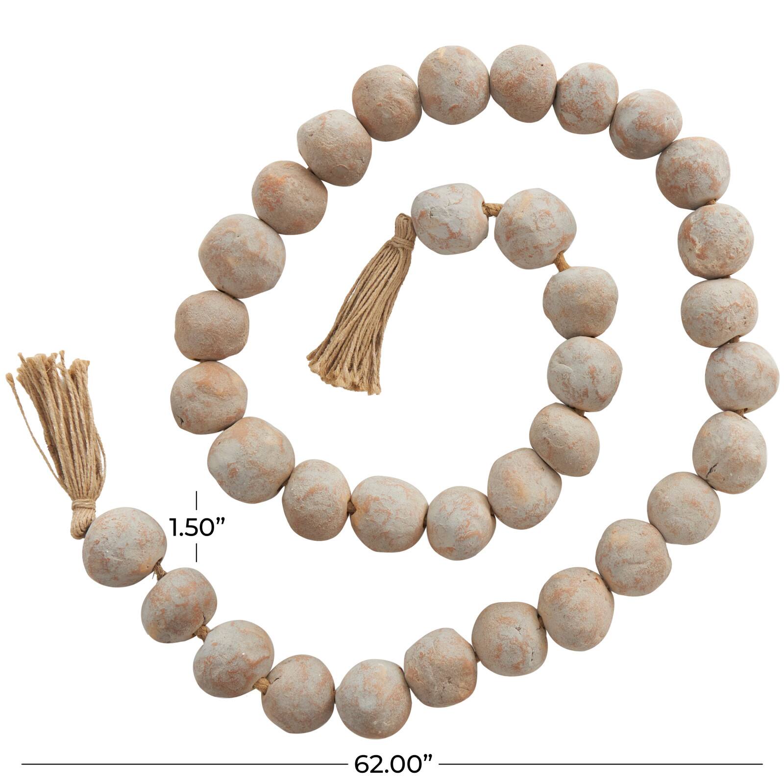 5ft. Paper Mache Round Distressed Beaded Garland with Tassel