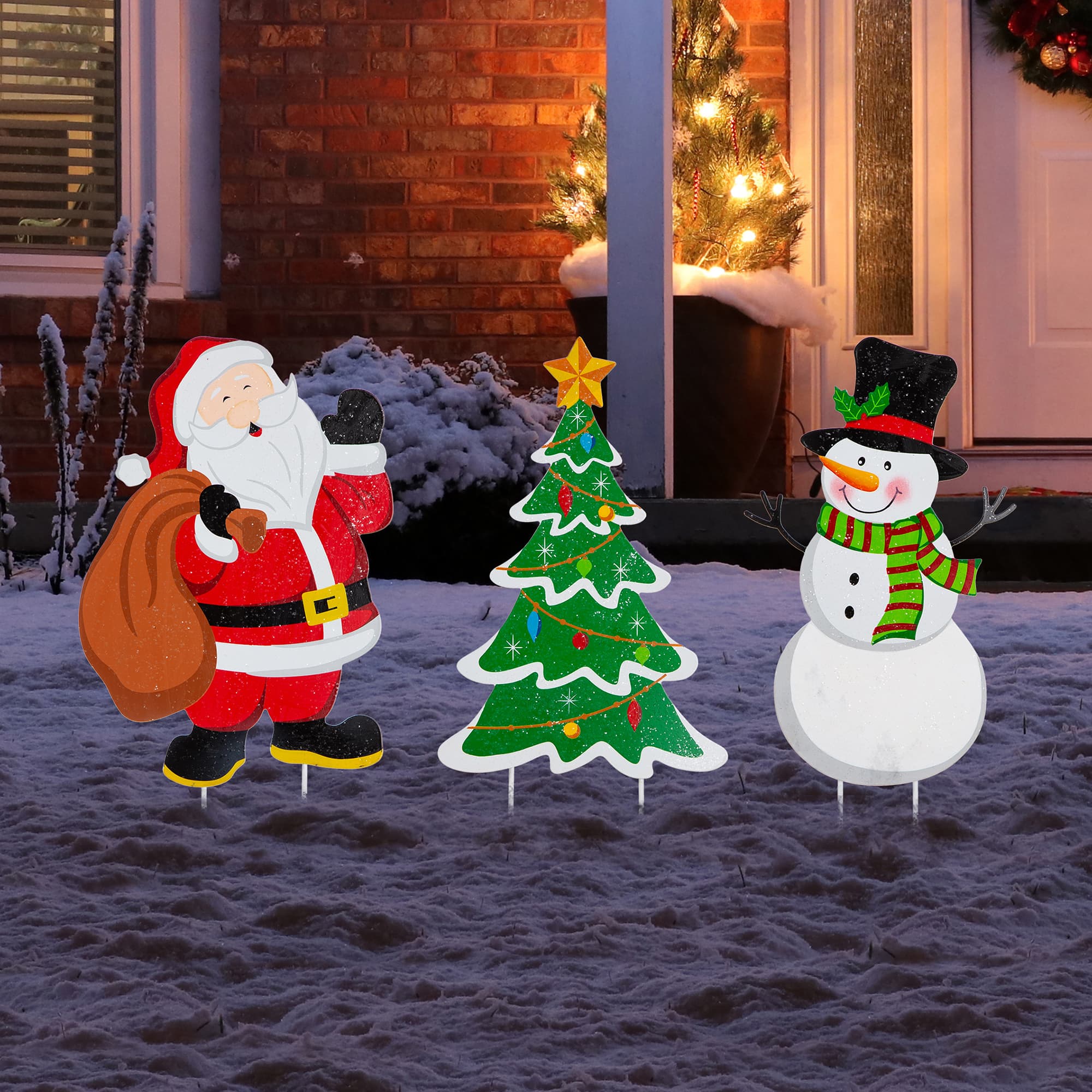 Glitzhome® 2ft. Metal Santa, Snowman & Tree Yard Stake Set