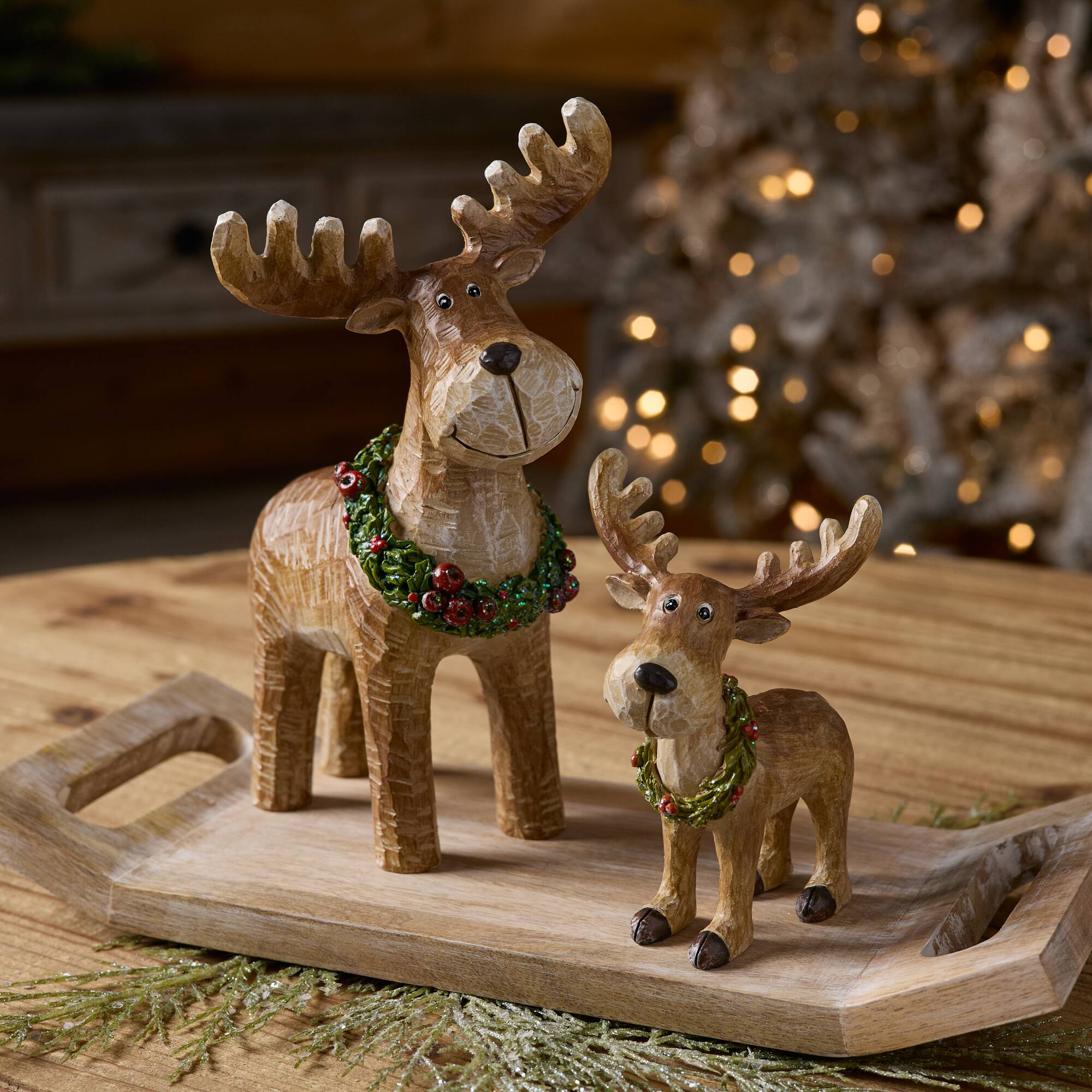 Melrose 5.25" Woodland Reindeer Figurines with Wreath, 2ct.